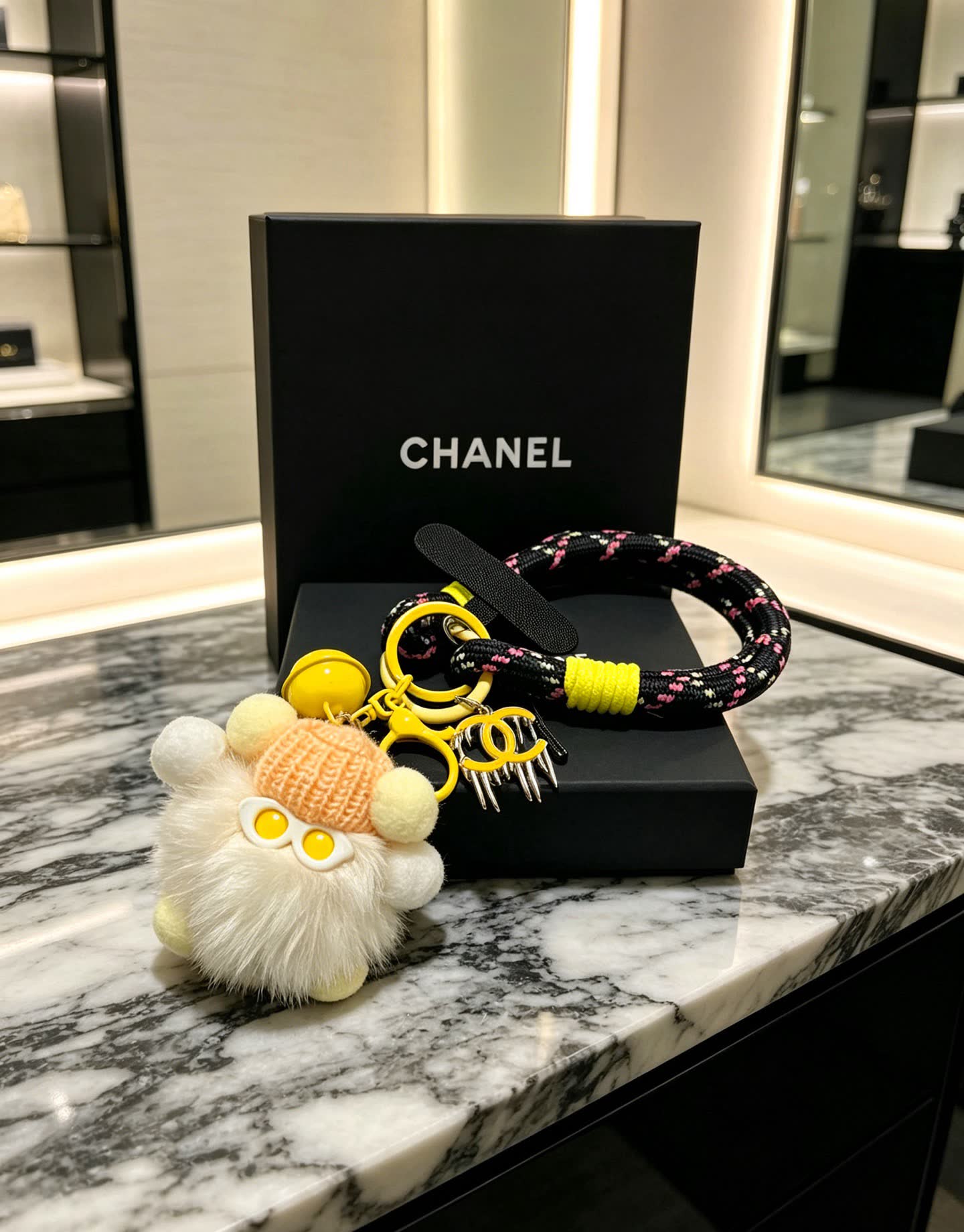 Chanel Keychain with Pom-Pom and Chain Strap