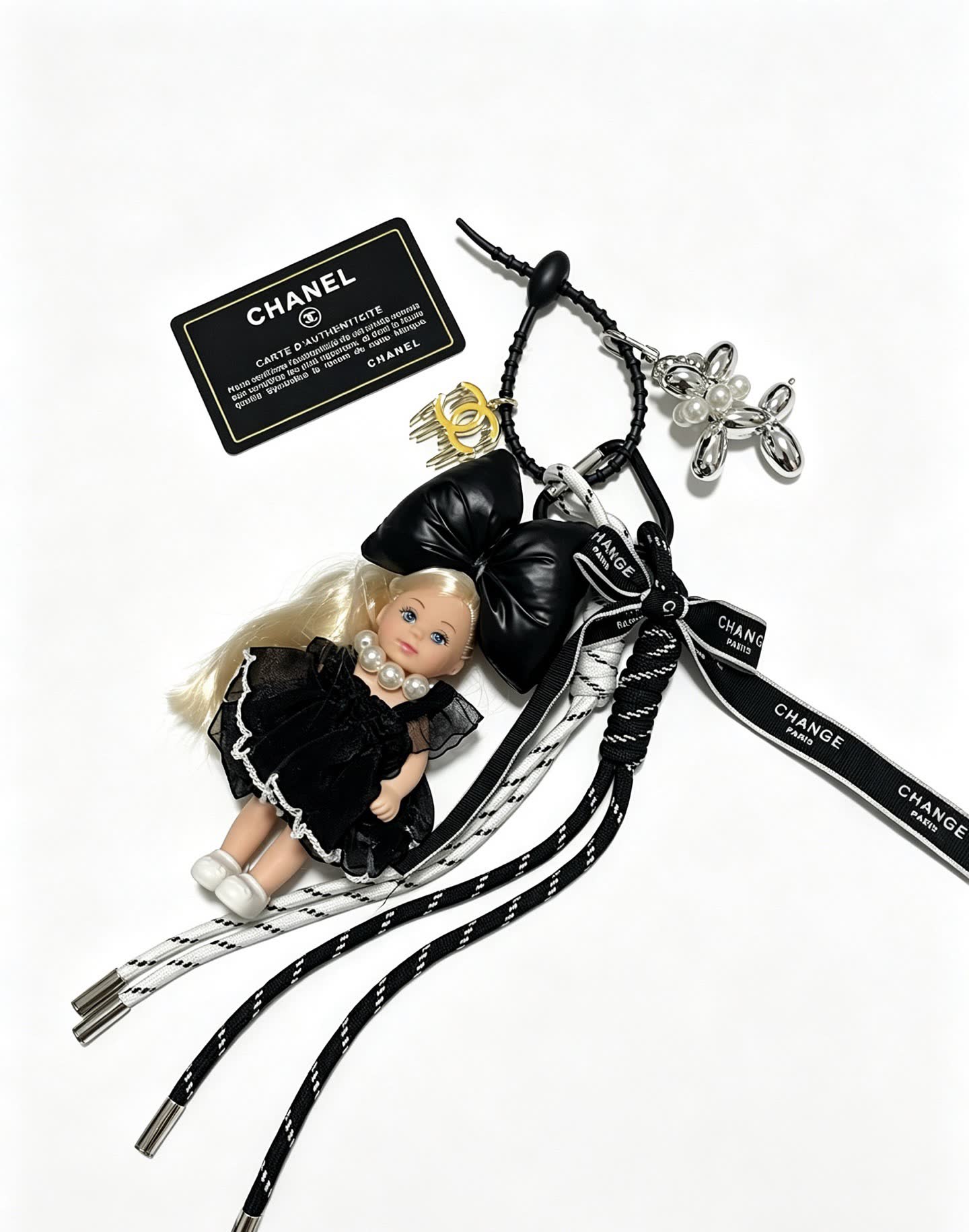 Chanel Black Leather Bow with Doll Charm
