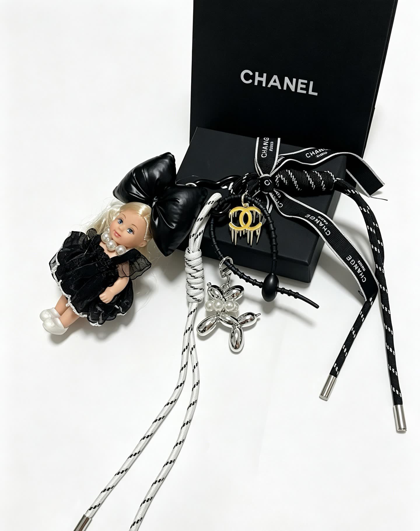 Chanel Black Leather Bow with Doll Charm