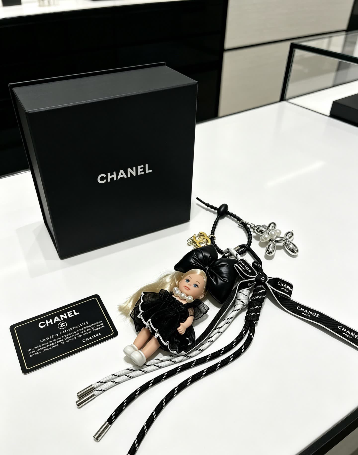 Chanel Black Leather Bow with Doll Charm