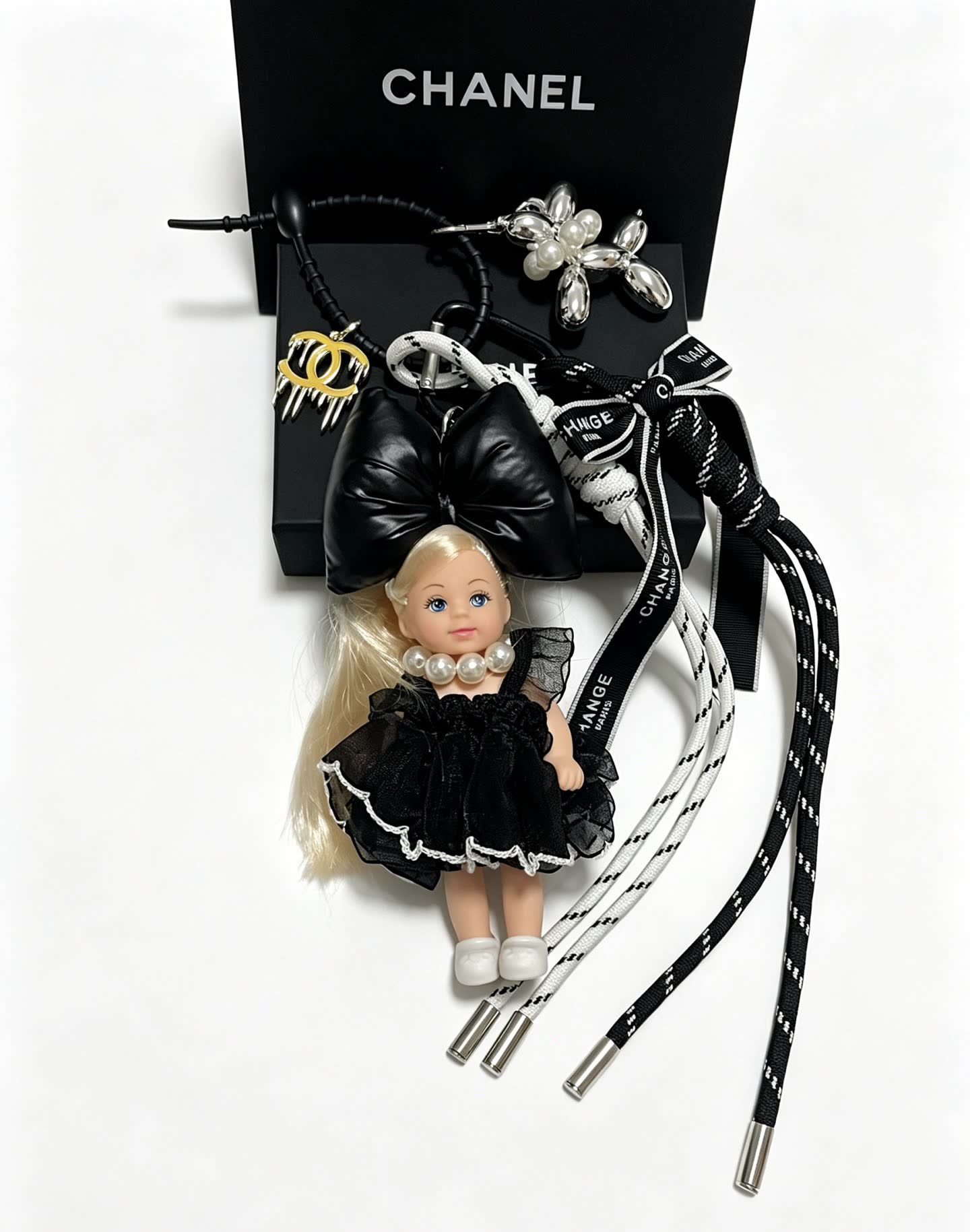 Chanel Black Leather Bow with Doll Charm