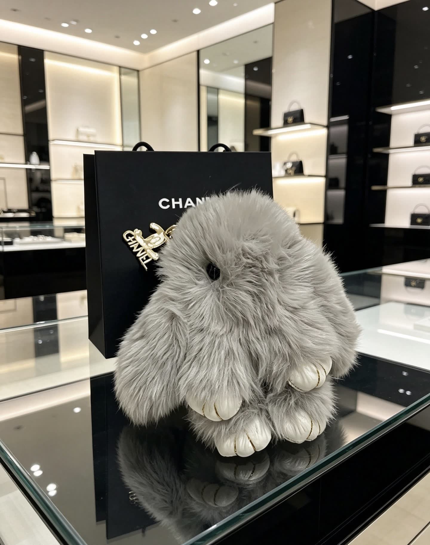 Chanel Gray Furry Keychain