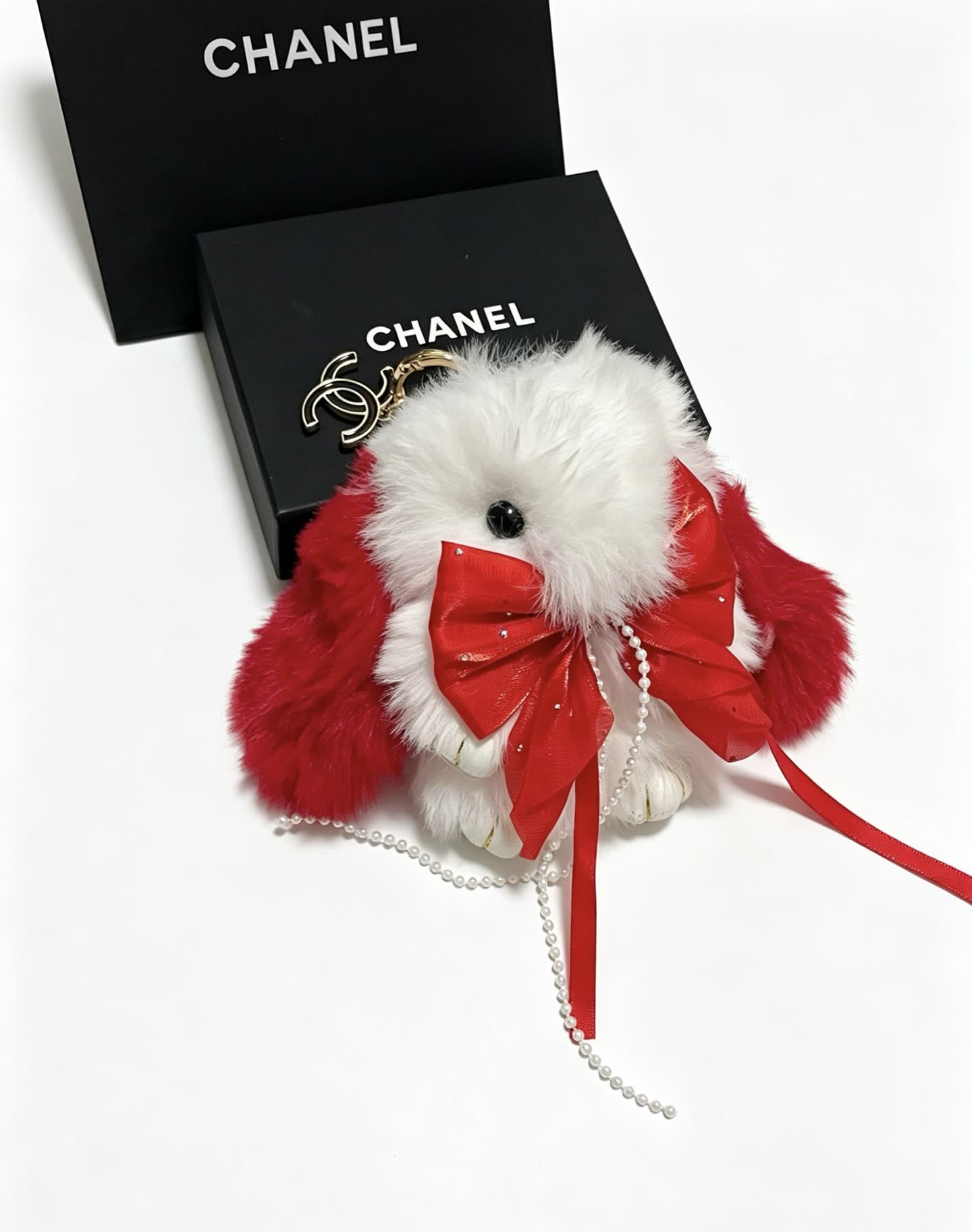 Chanel White and Red Furry Keychain