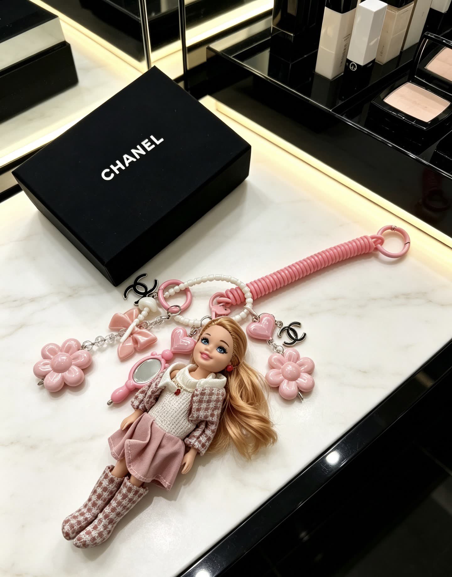Chanel Fashion Doll Keychain with Pink Flowers and Accessories