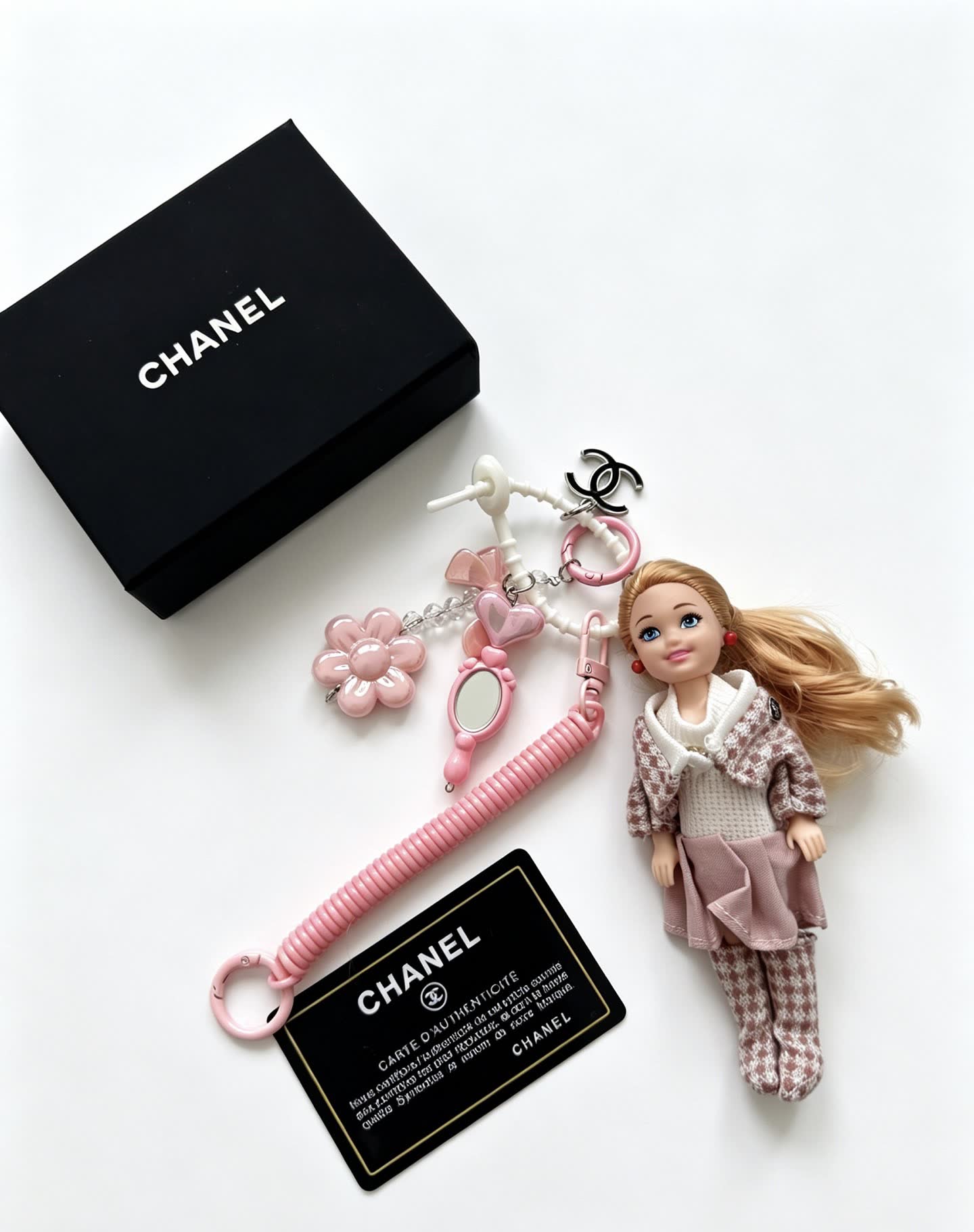 Chanel Fashion Doll Keychain with Pink Flowers and Accessories