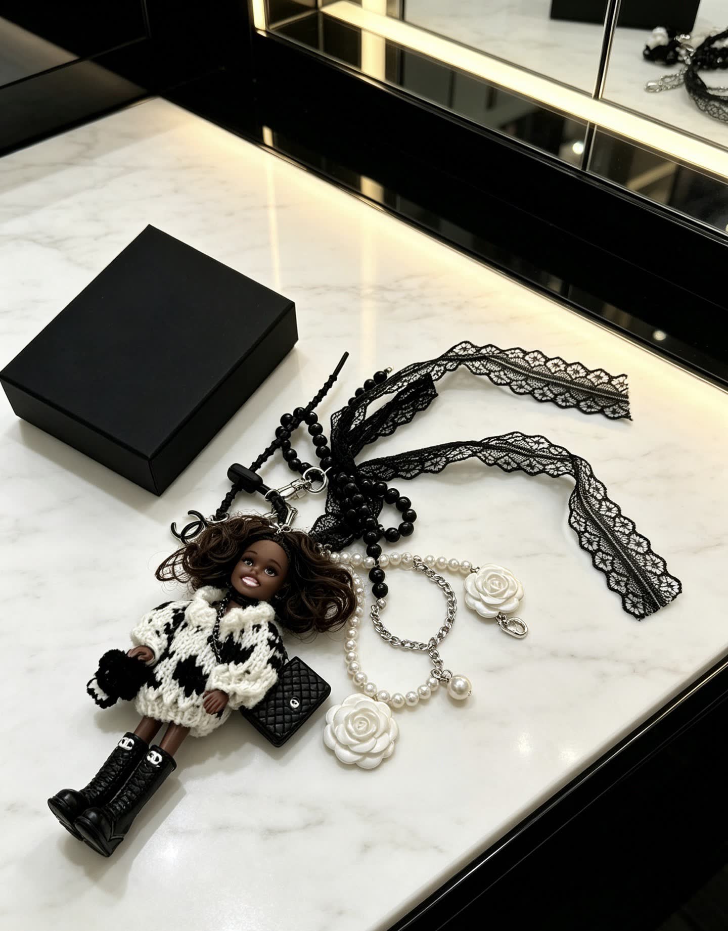 Chanel Black and White Doll Charm