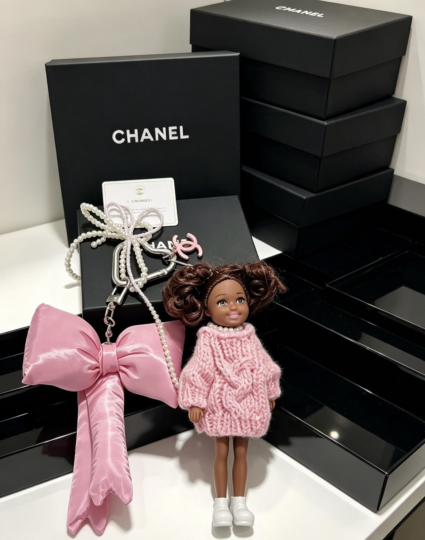 Chanel Pink Satin Bow Keychain with Doll Charm