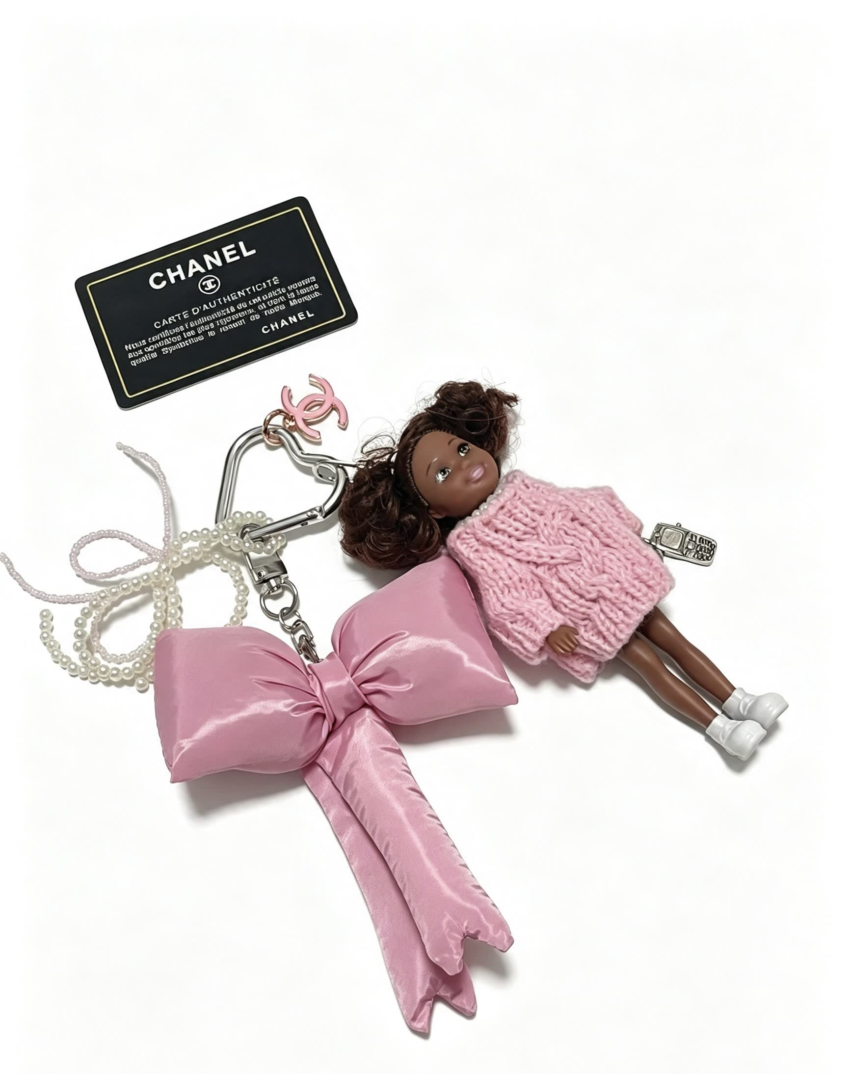 Chanel Pink Satin Bow Keychain with Doll Charm