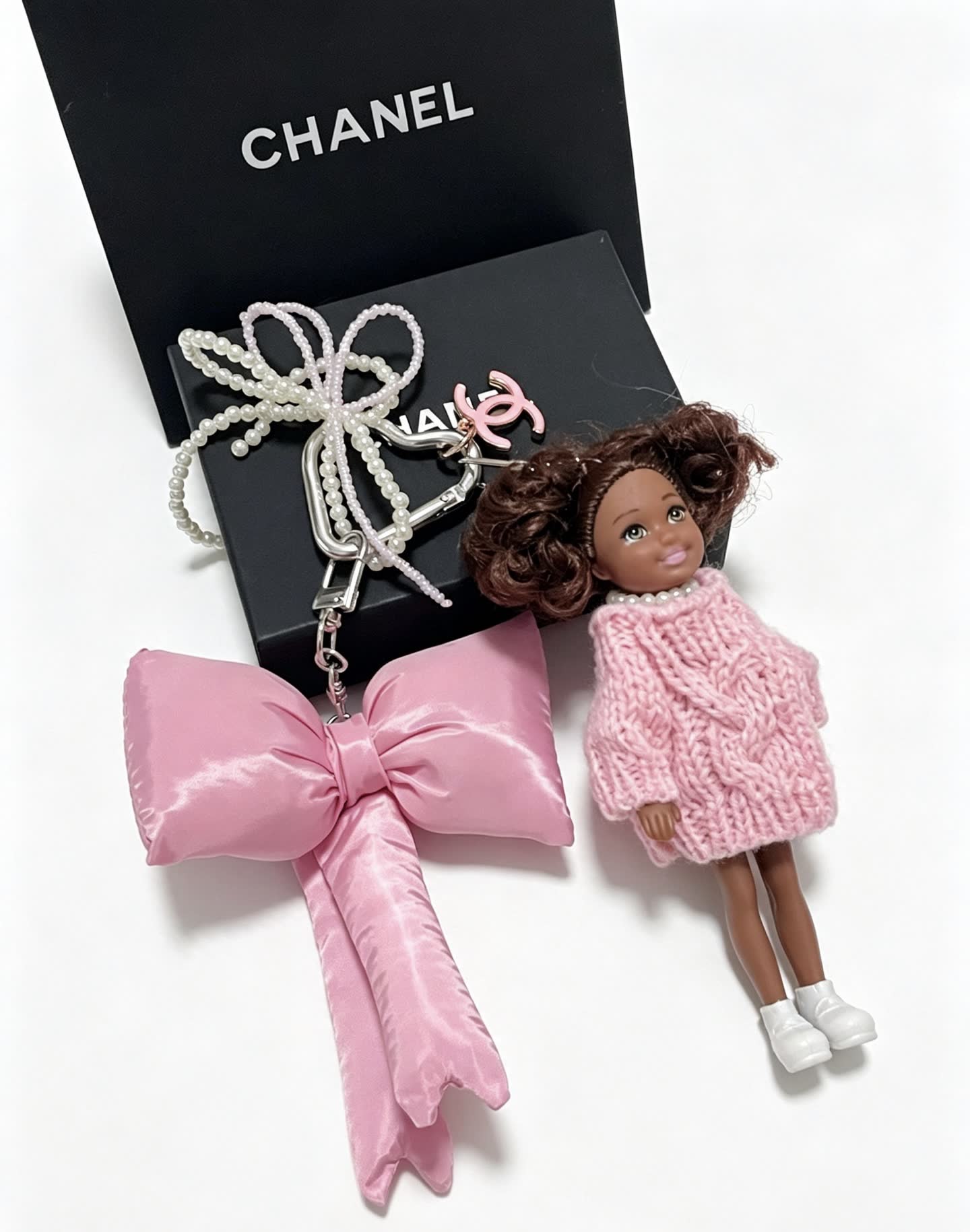 Chanel Pink Satin Bow Keychain with Doll Charm