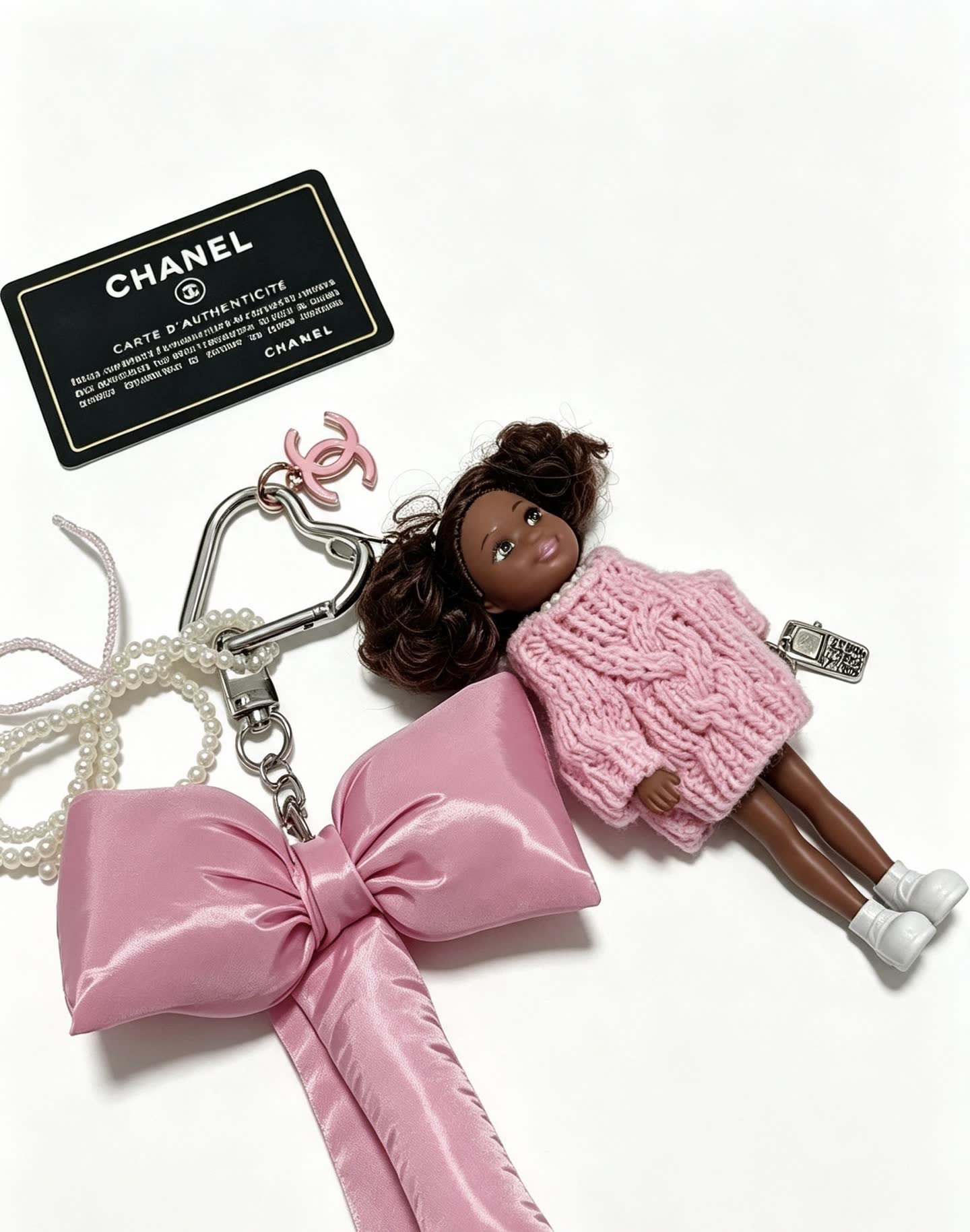 Chanel Pink Satin Bow Keychain with Doll Charm