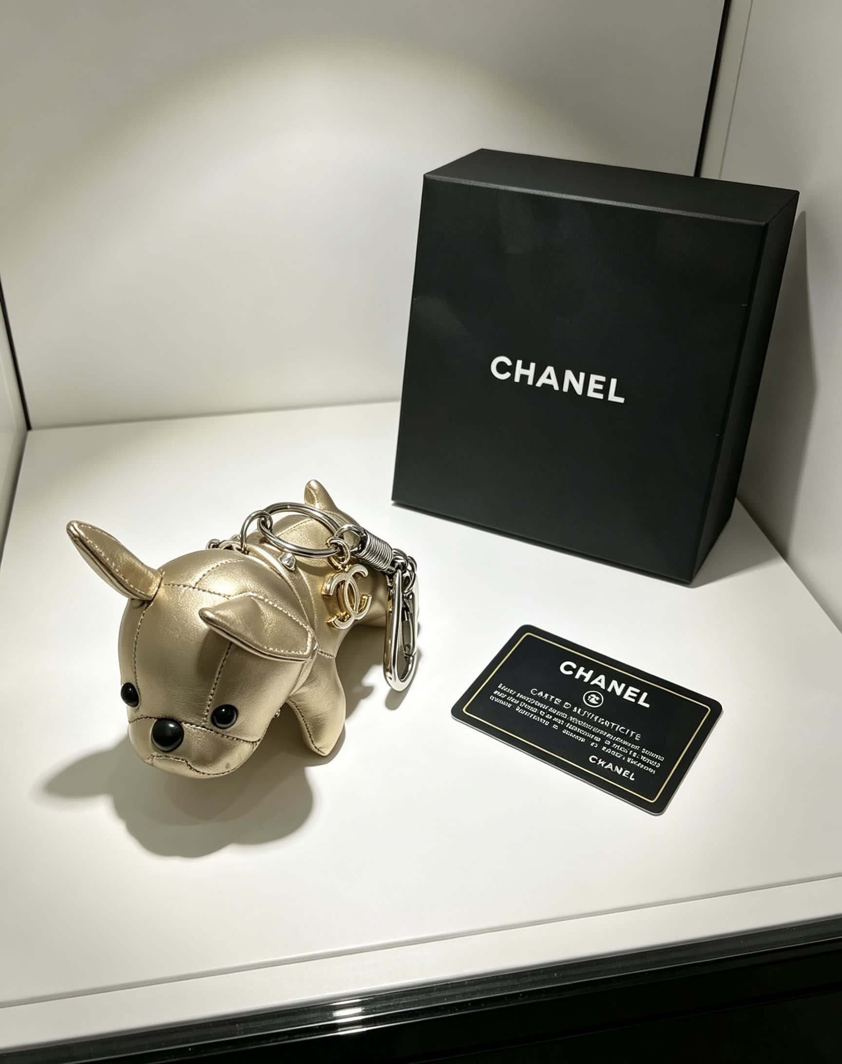 Chanel Gold Leather Dog Keychain