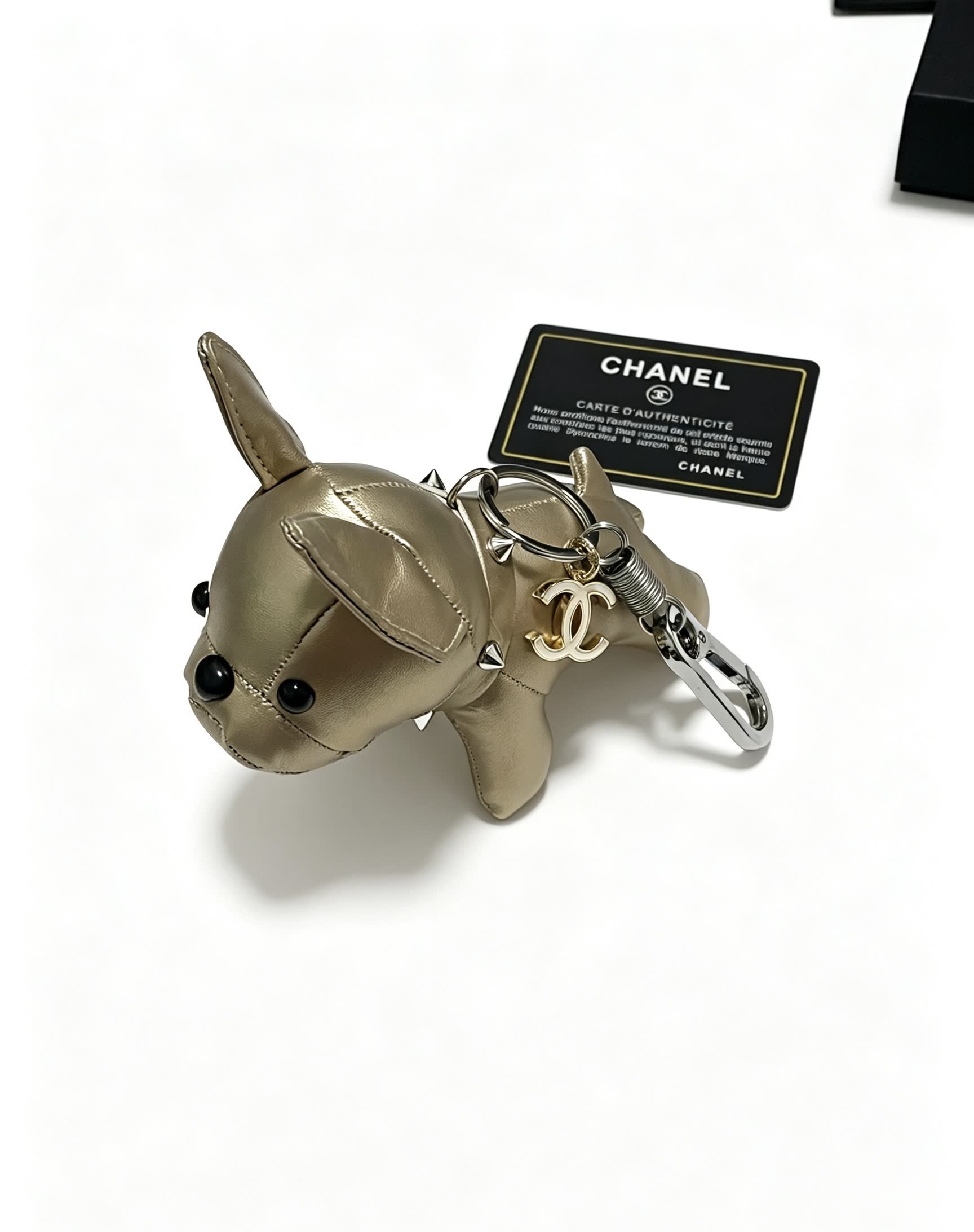 Chanel Gold Leather Dog Keychain