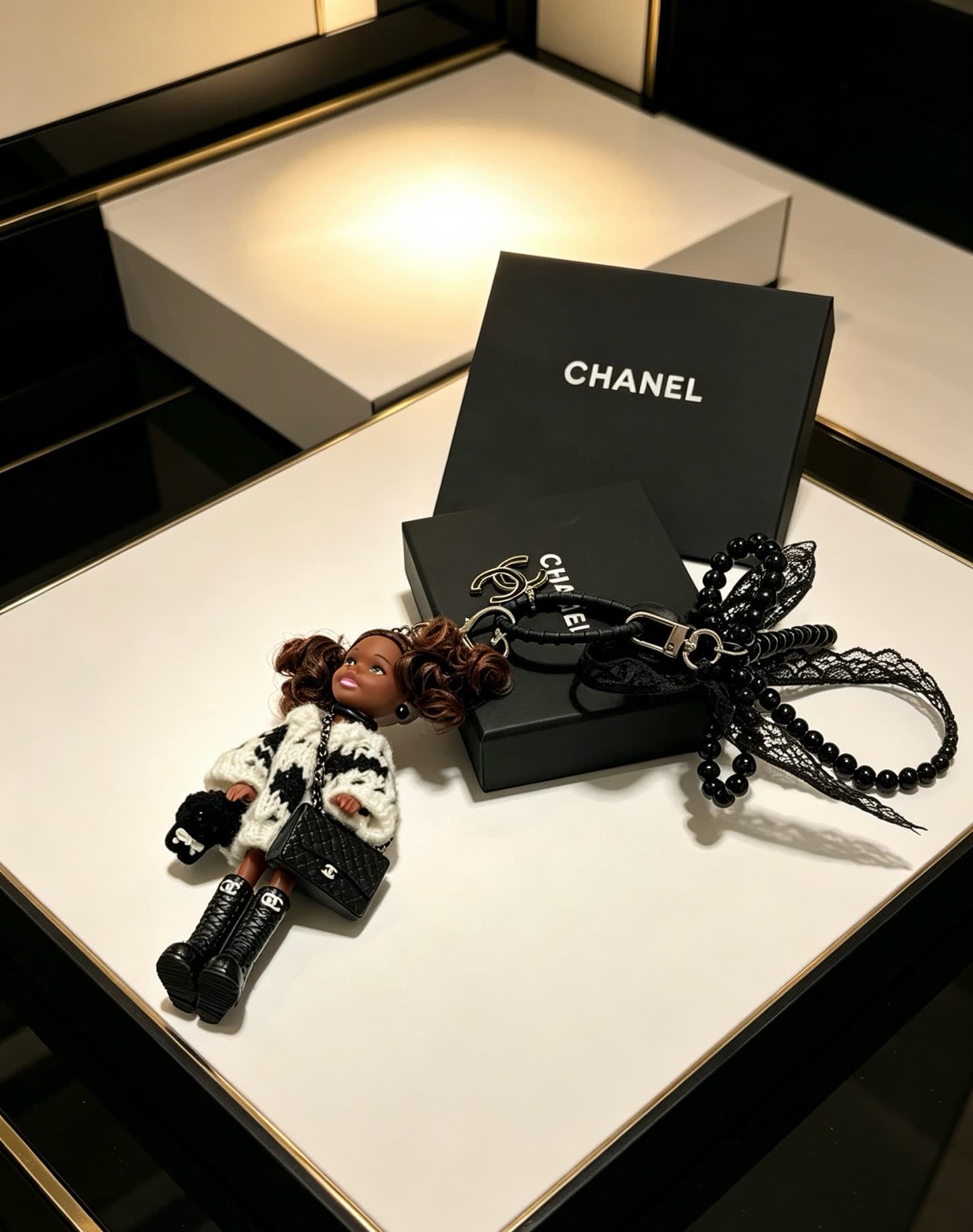 Chanel Keychain with Beaded Chain and Doll Charm Chanel Keychain with Beaded Chain and Doll Charm