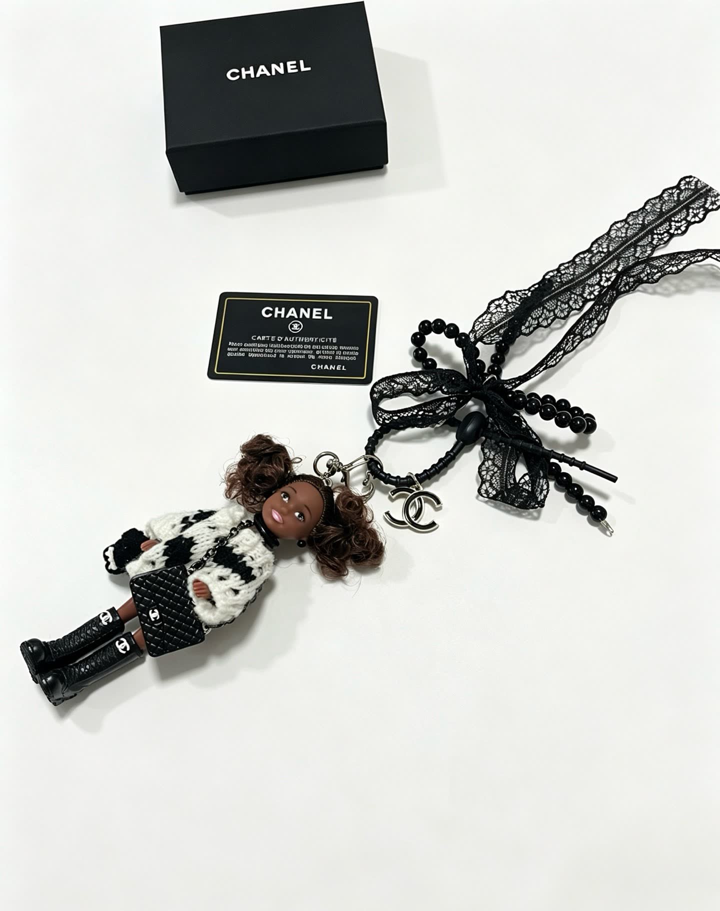Chanel Keychain with Beaded Chain and Doll Charm