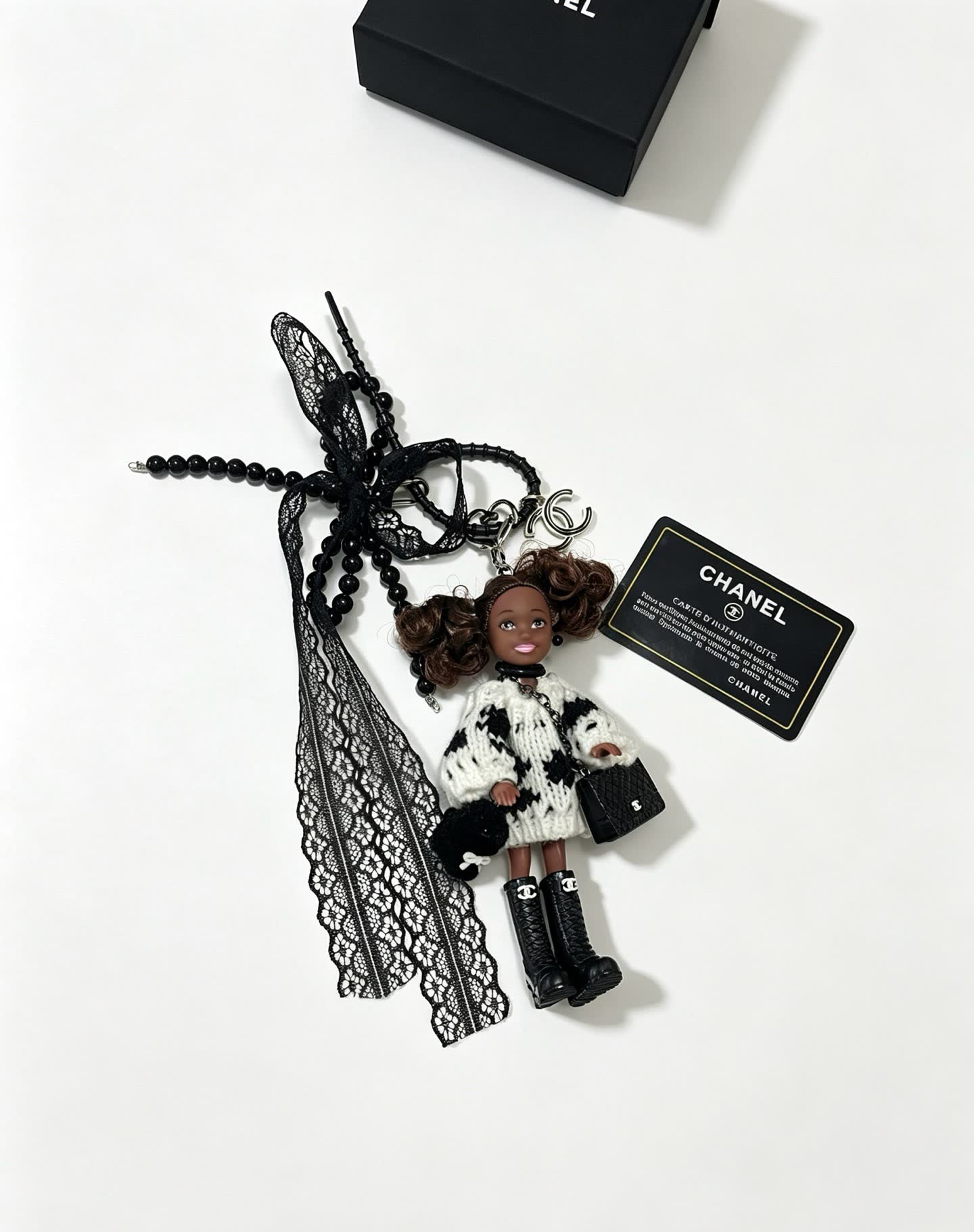 Chanel Keychain with Beaded Chain and Doll Charm