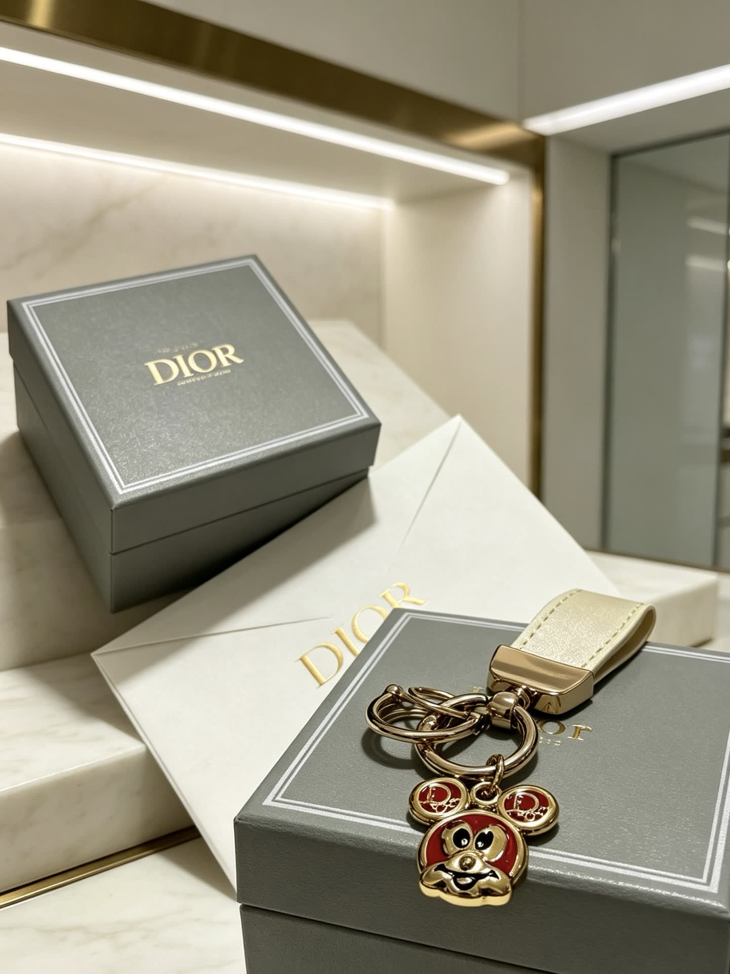 Dior Leather Keychain with Gold-Tone Charms