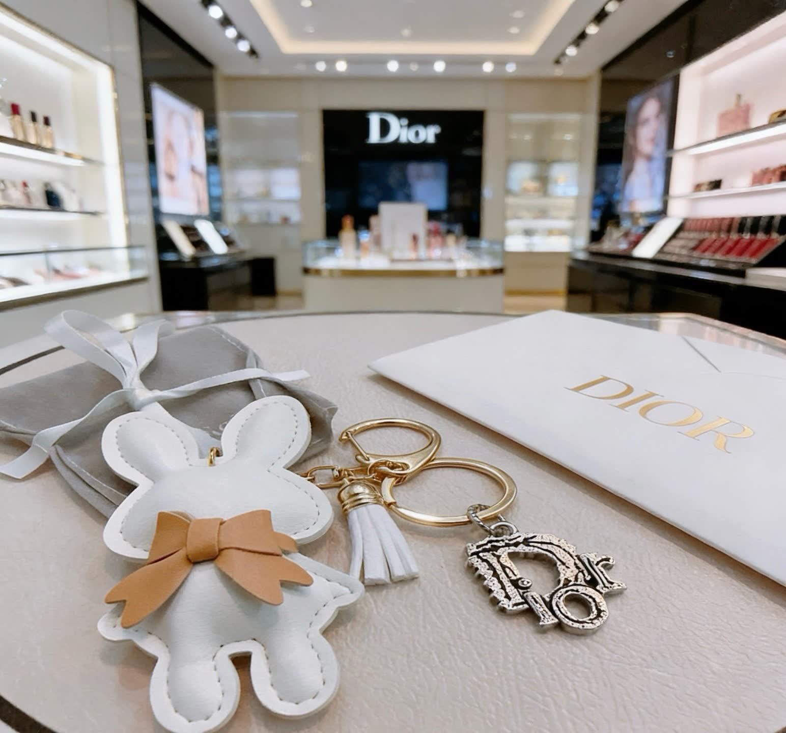 Dior White Bunny Keychain with Gold 'D' Charm