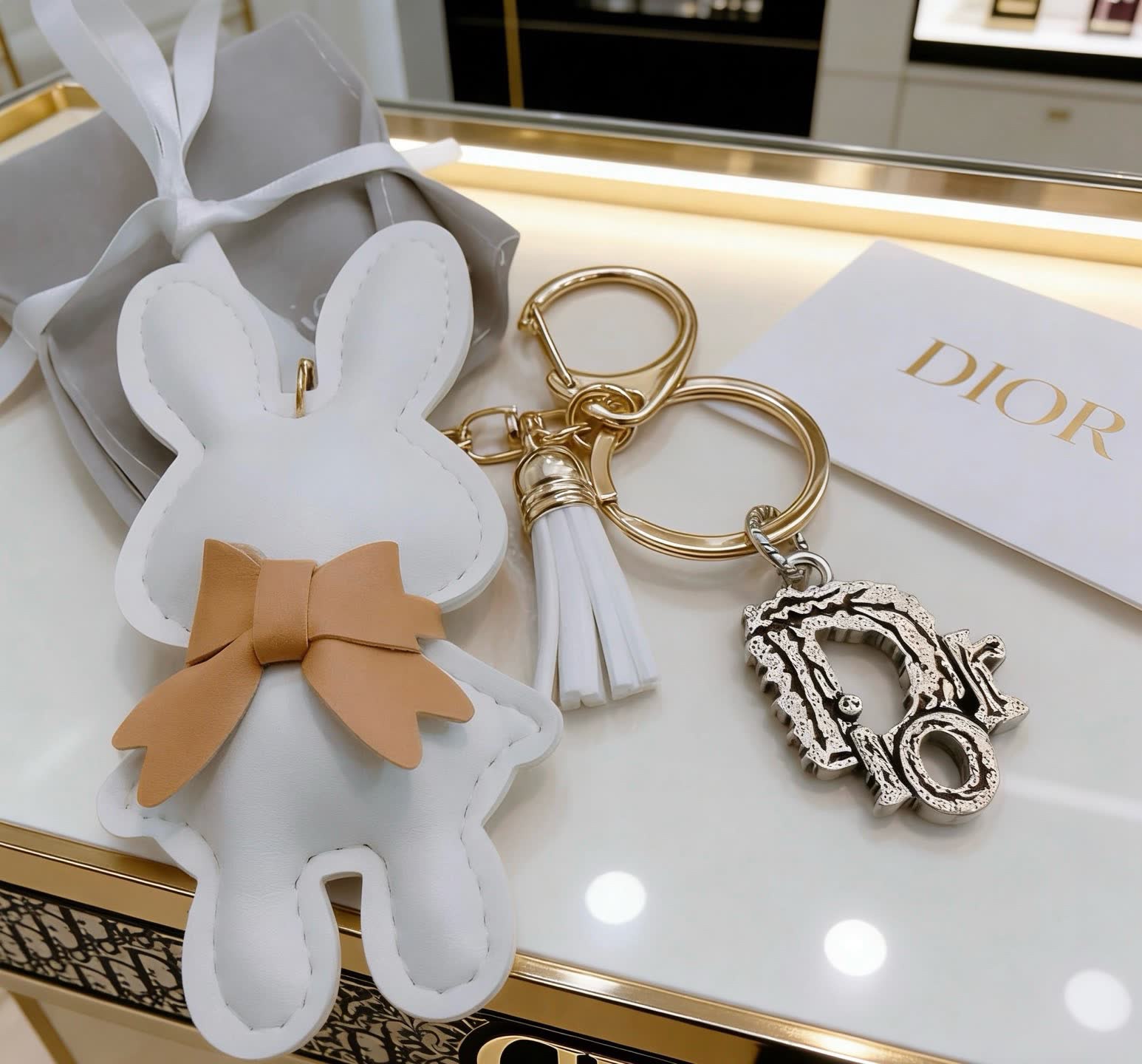 Dior White Bunny Keychain with Gold 'D' Charm
