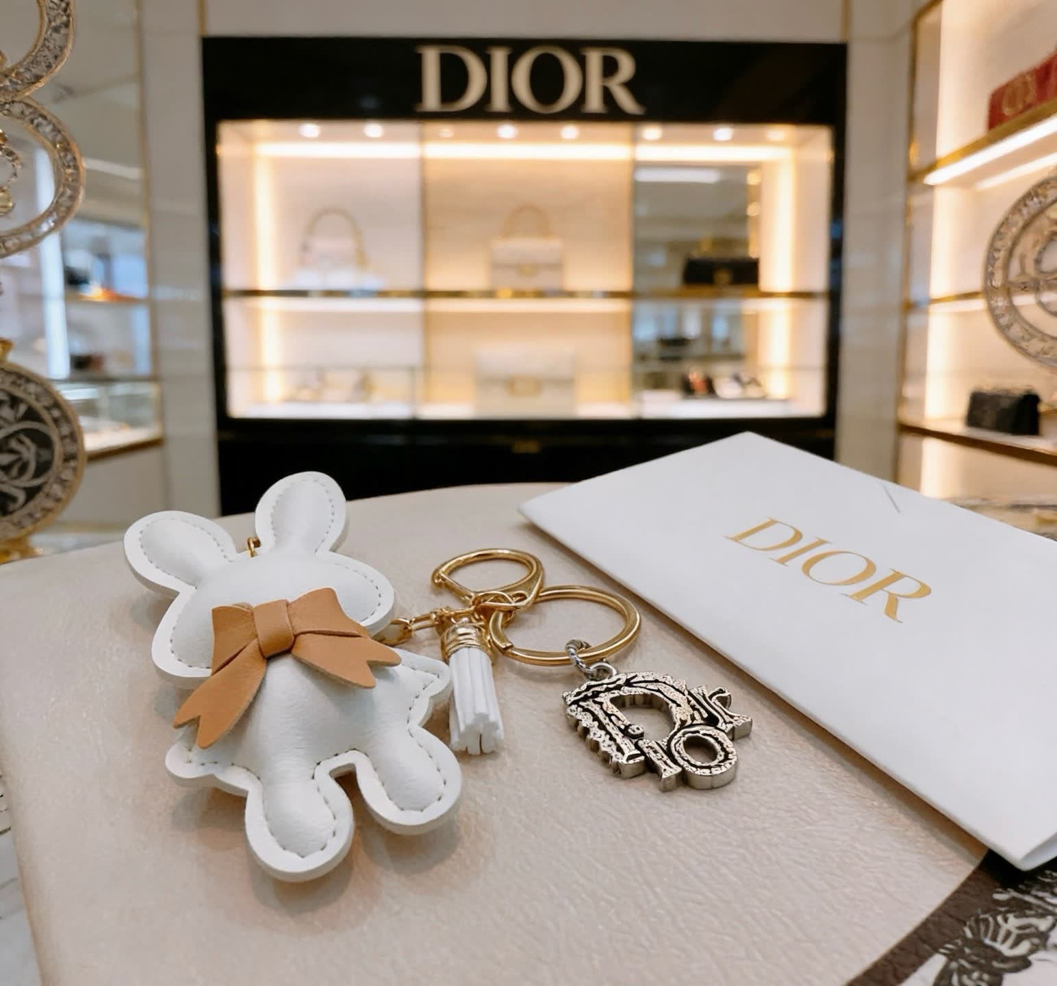 Dior White Bunny Keychain with Gold 'D' Charm