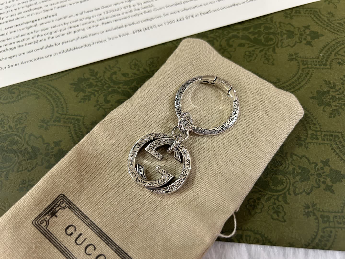Gucci Silver Keychain with Interlocking G Logo