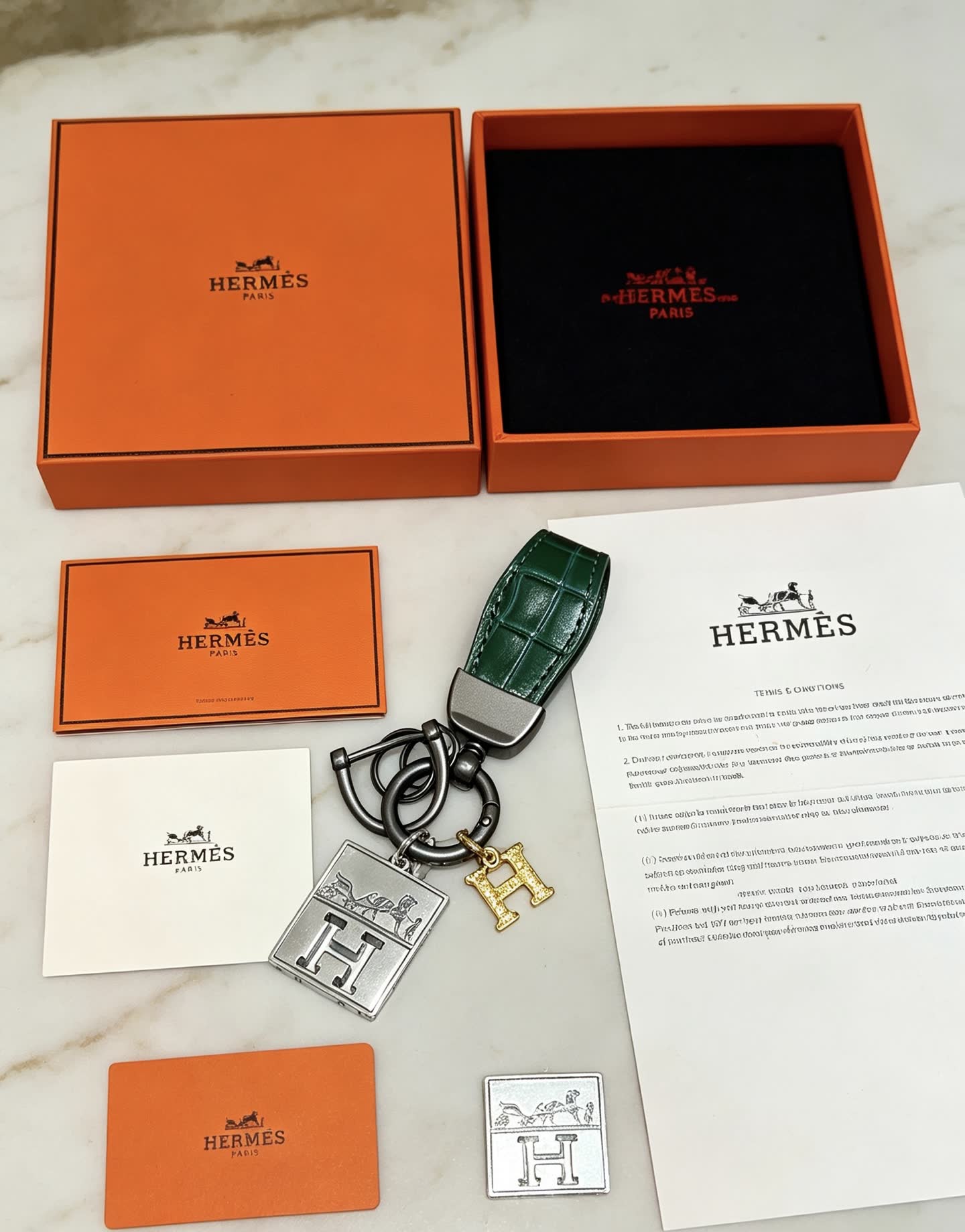 Hermes Hermès Paris Leather Bag Charm with Gold 'H' and Silver Plate