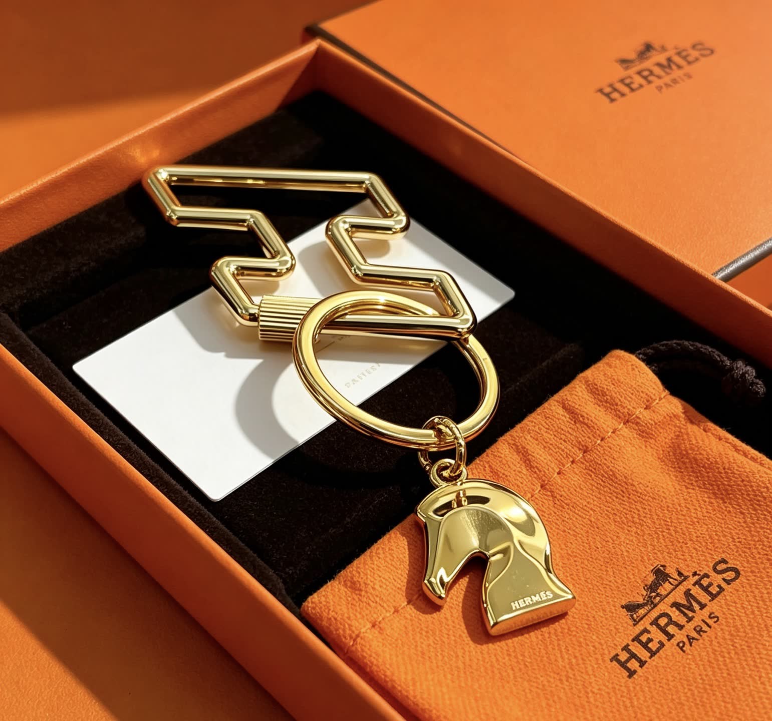 Hermès Gold-Tone Leather Keychain with Horse Head Charm
