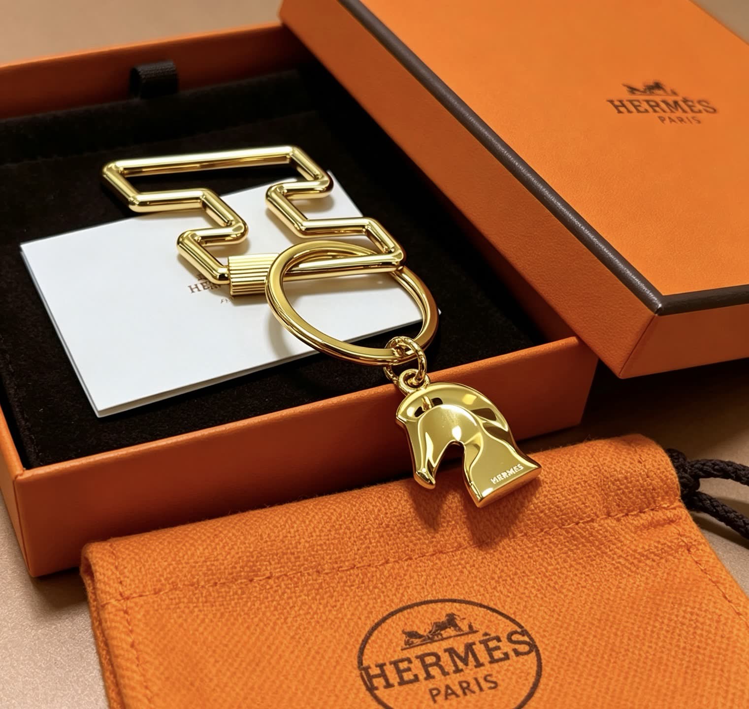 Hermès Gold-Tone Leather Keychain with Horse Head Charm