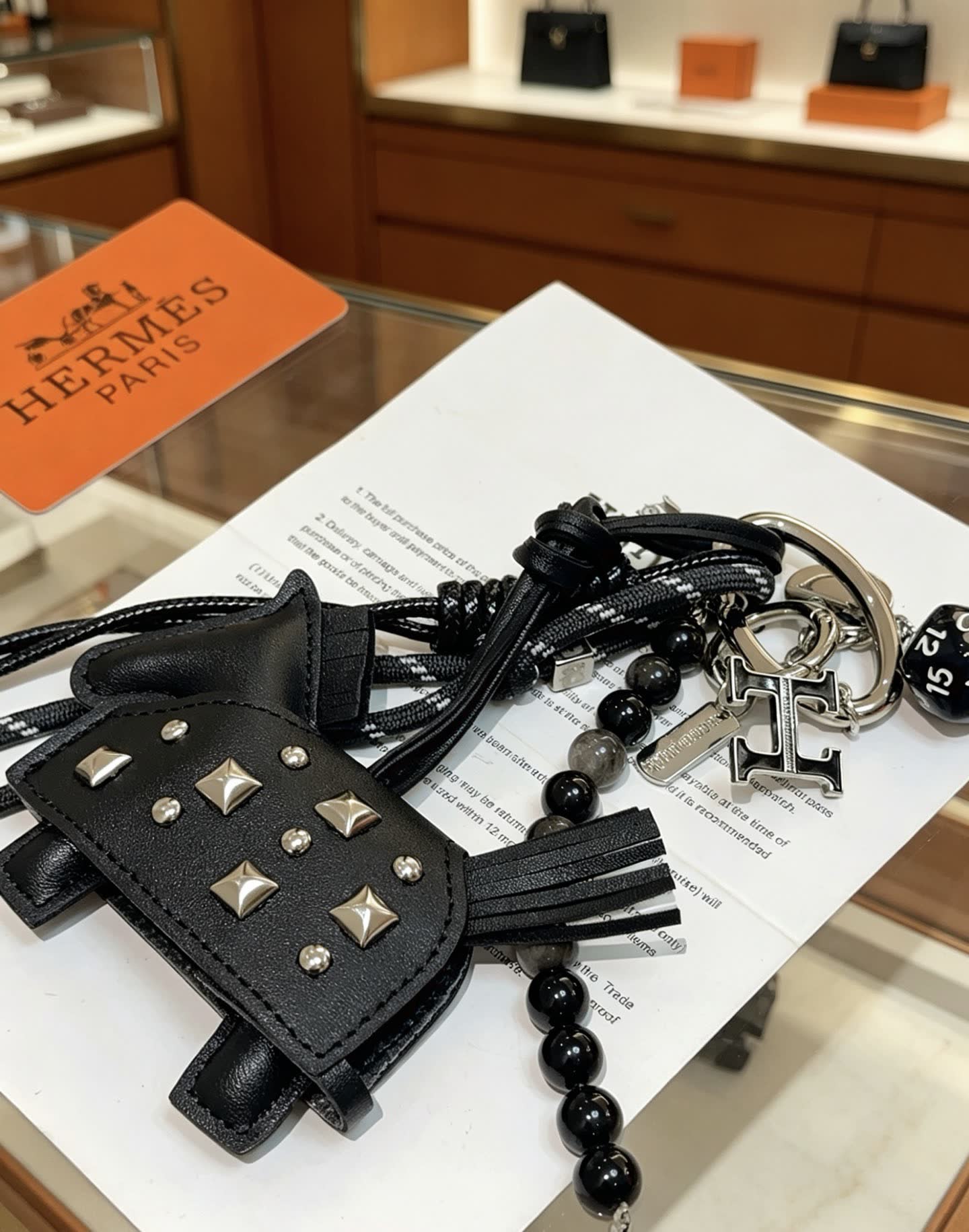 Hermes Hermès Black Leather Keychain with Studs and Beads