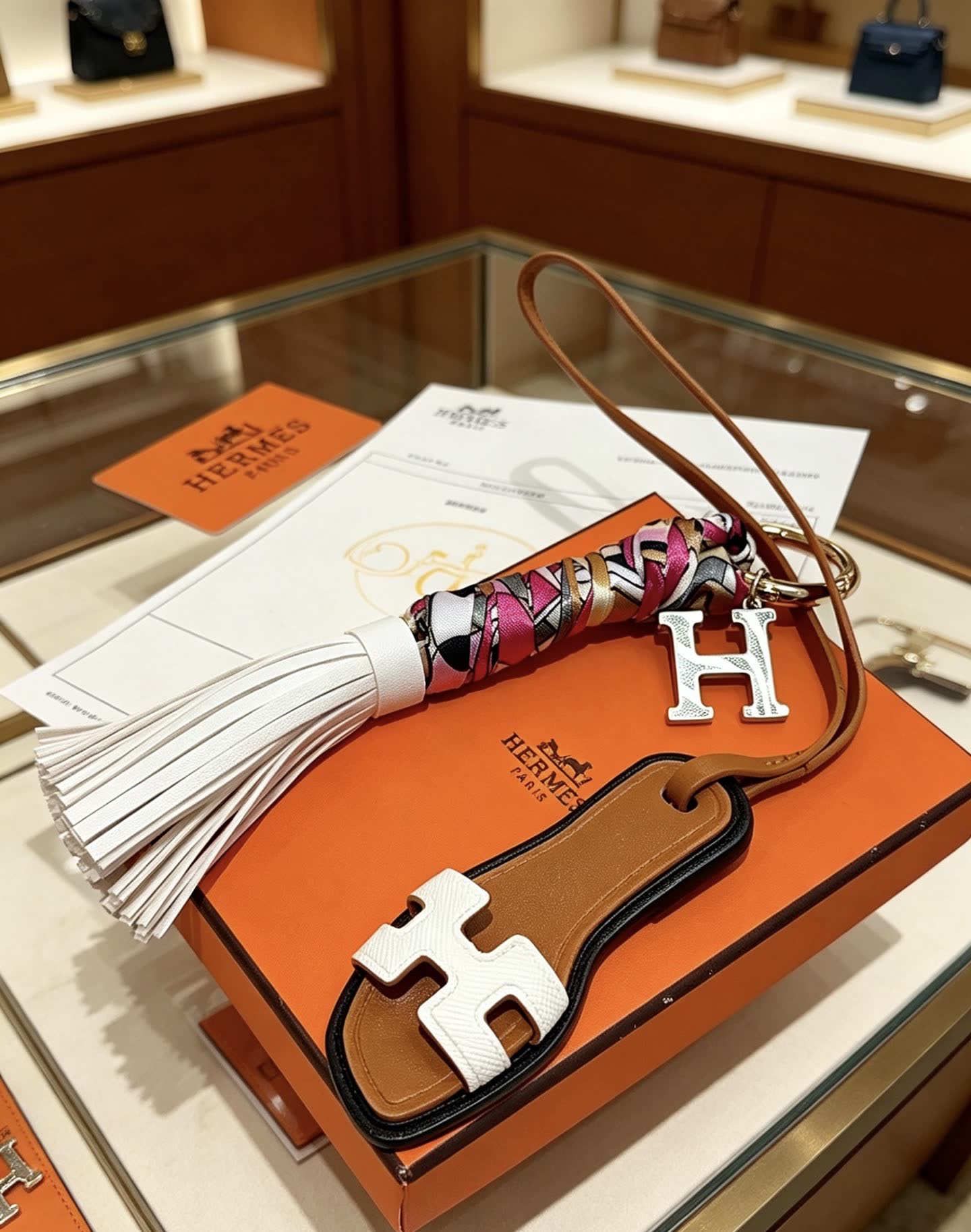 Hermes Hermès Keychain with Tassel and Metal Charms