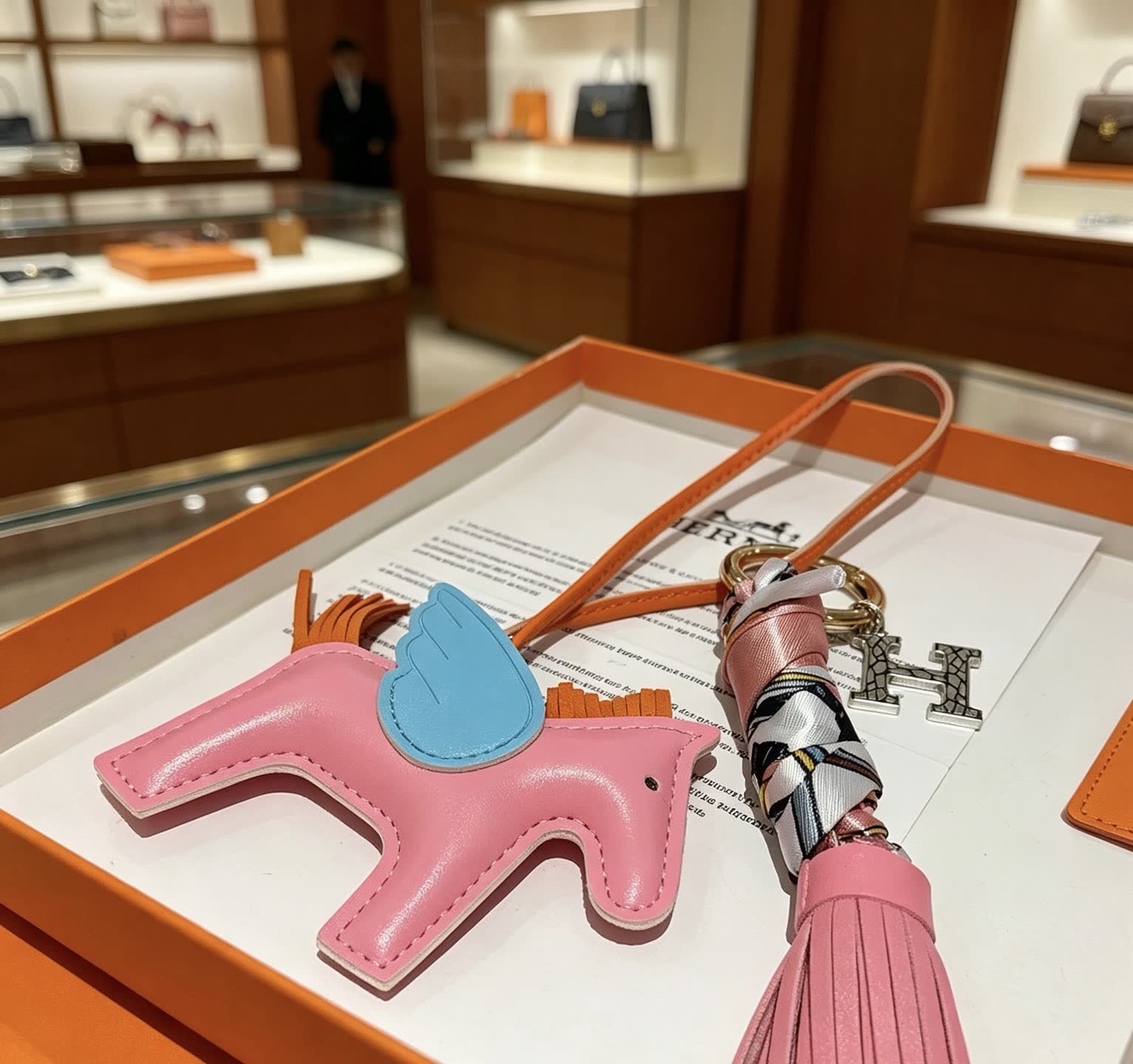 Hermes Hermès Keychain with Pink Winged Horse