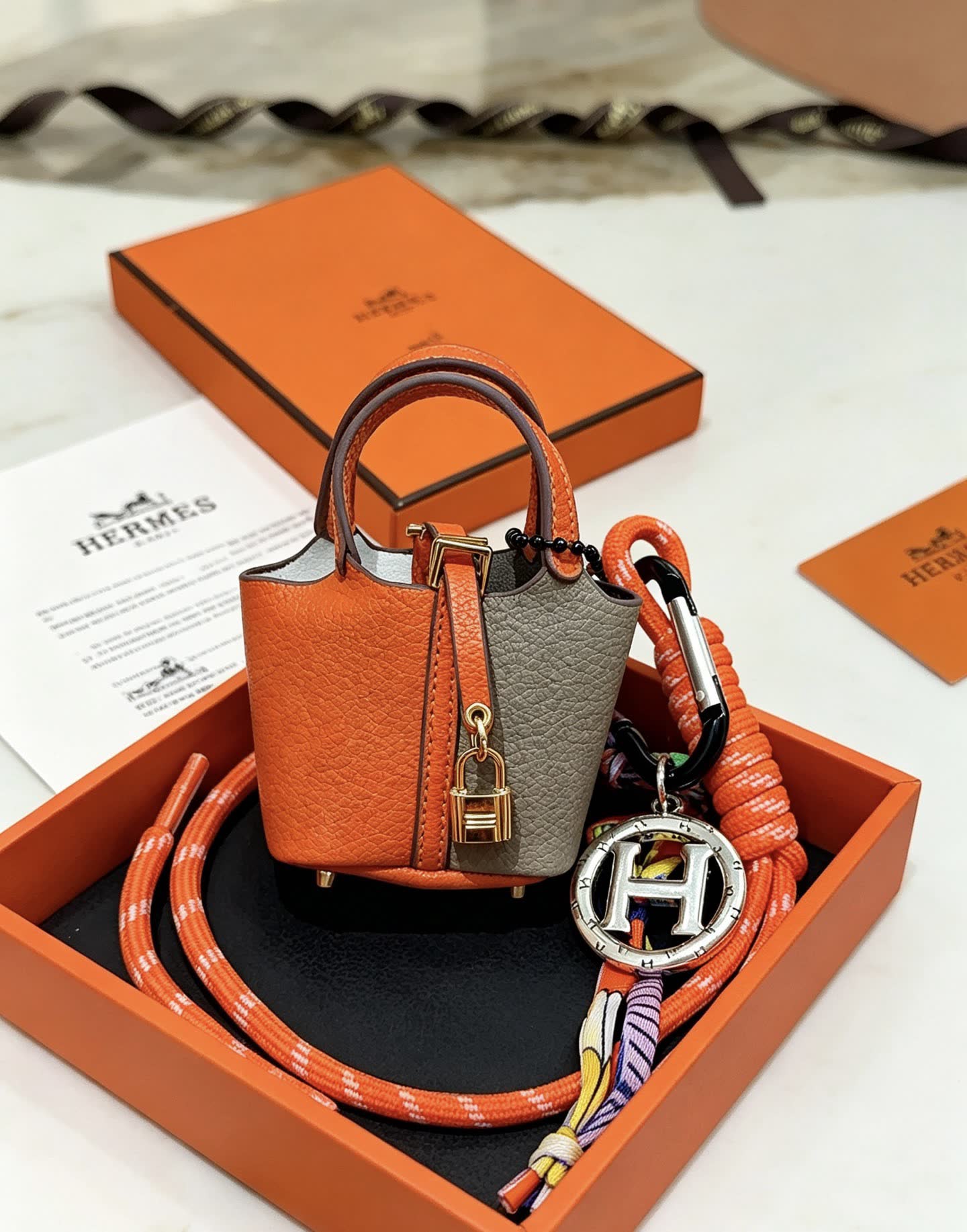Hermes Hermès Orange Leather Keychain with Lock and Carabiner Hermes Hermès Orange Leather Keychain with Lock and Carabiner