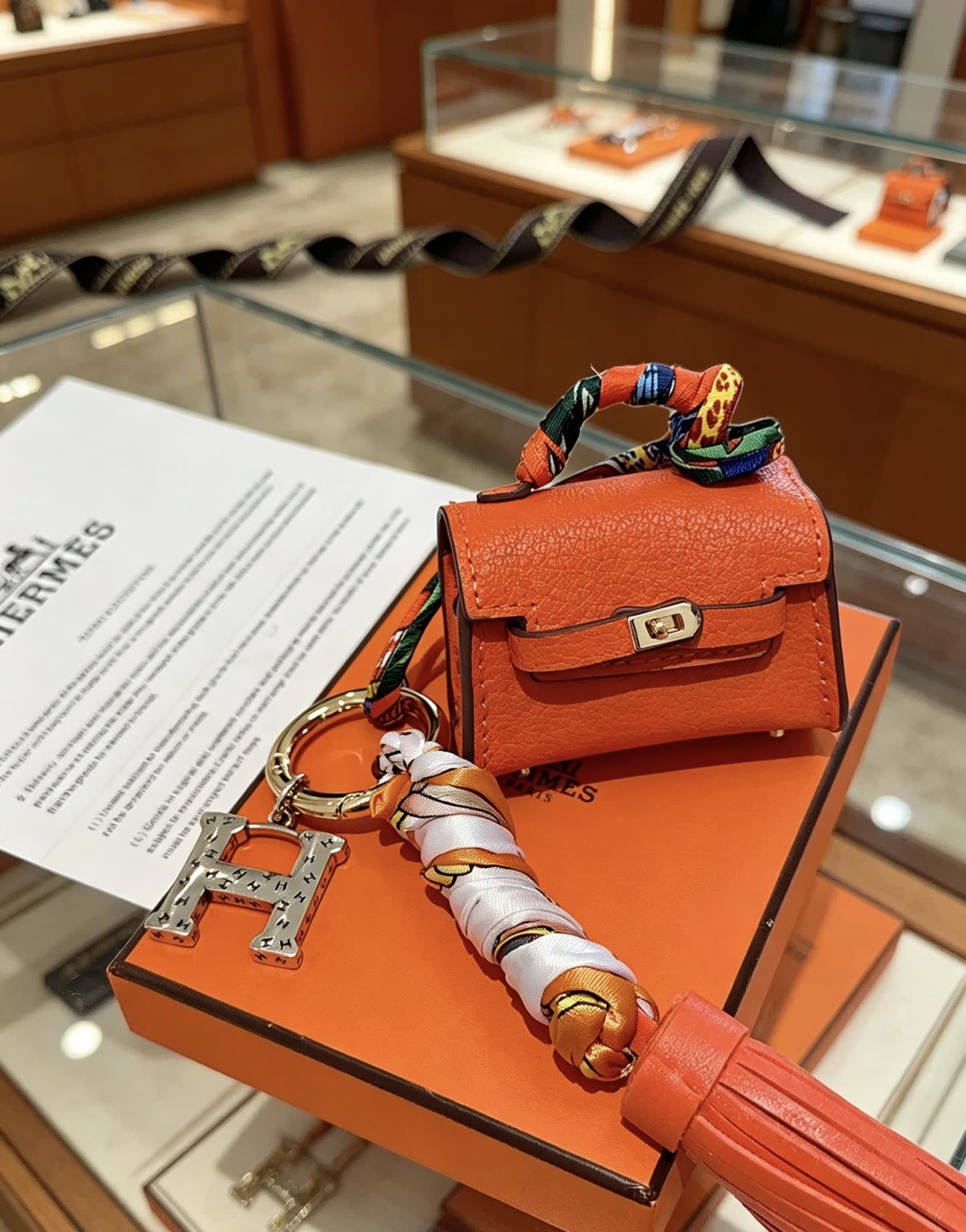 Hermes Hermès Orange Leather Keychain with Tassel Hermes Hermès Orange Leather Keychain with Tassel