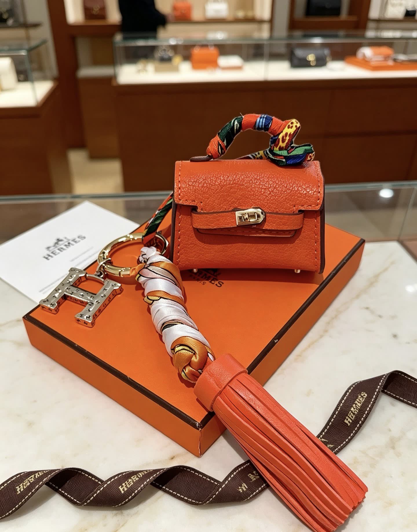 Hermes Hermès Orange Leather Keychain with Tassel
