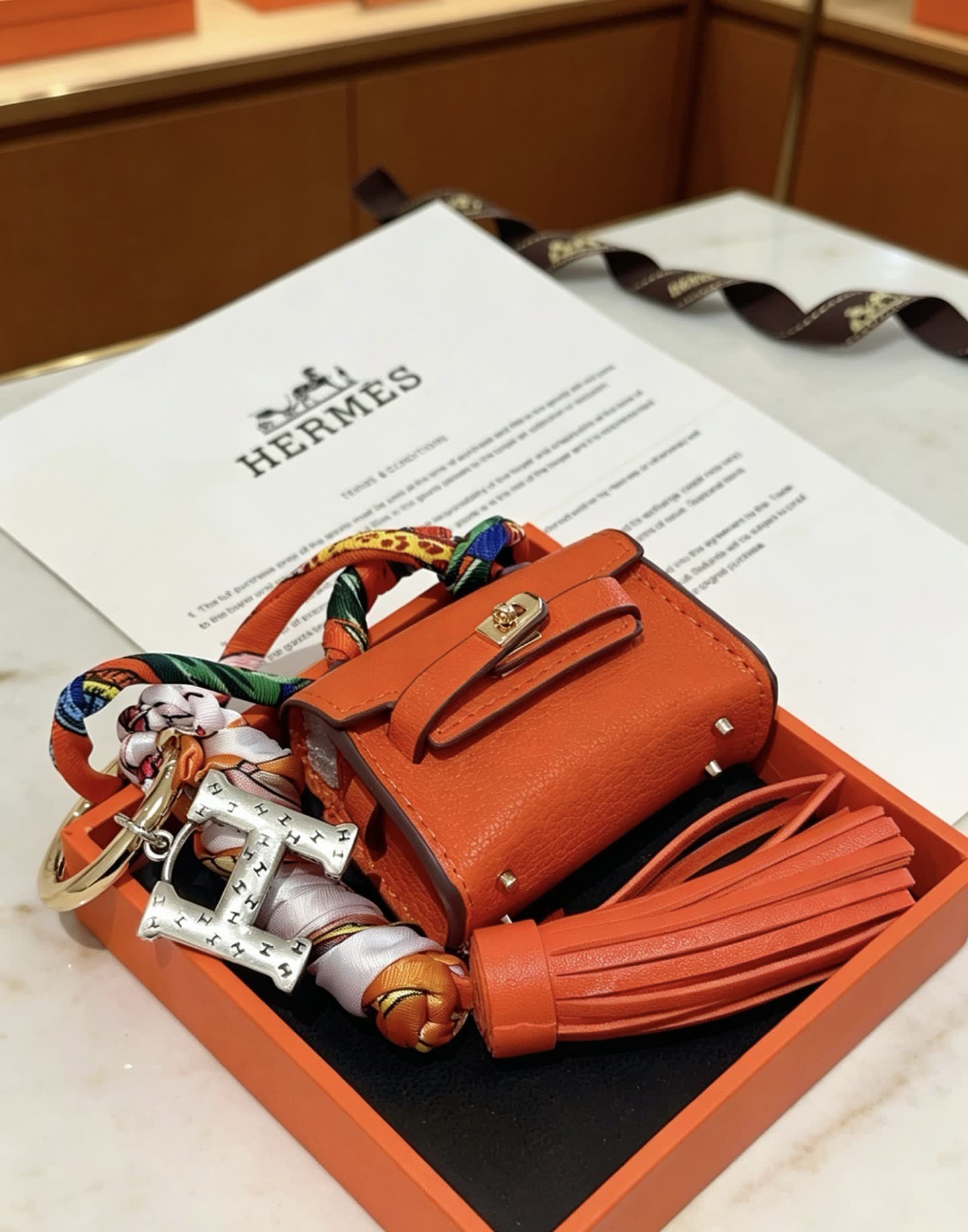 Hermes Hermès Orange Leather Keychain with Tassel