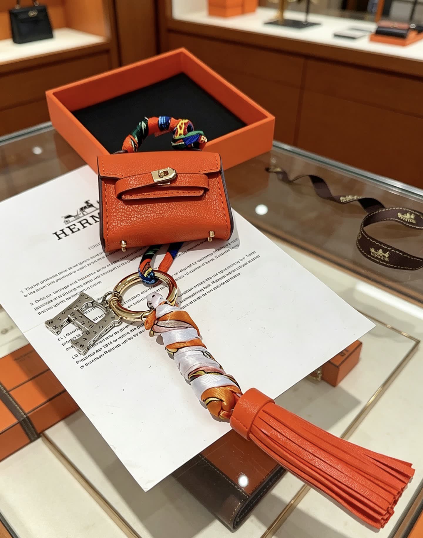 Hermes Hermès Orange Leather Keychain with Tassel