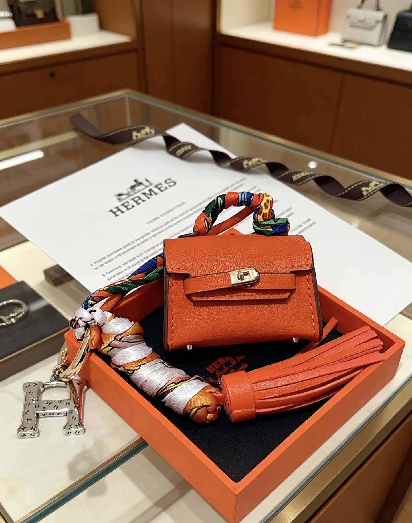 Hermes Hermès Orange Leather Keychain with Tassel