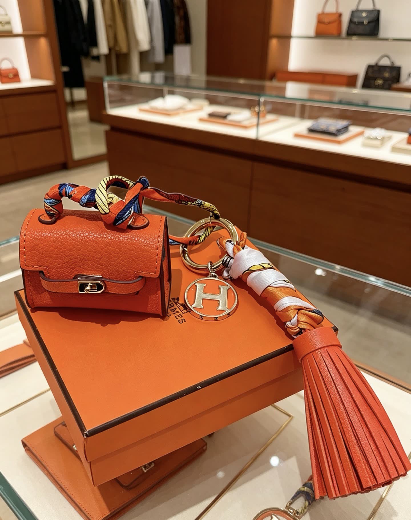 Hermes Hermès Orange Leather Keychain with Tassel Hermes Hermès Orange Leather Keychain with Tassel