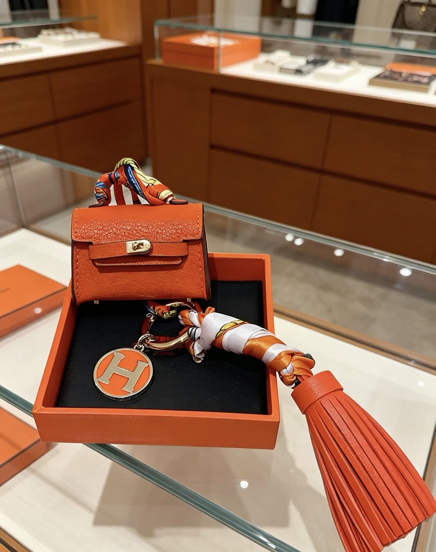 Hermes Hermès Orange Leather Keychain with Tassel