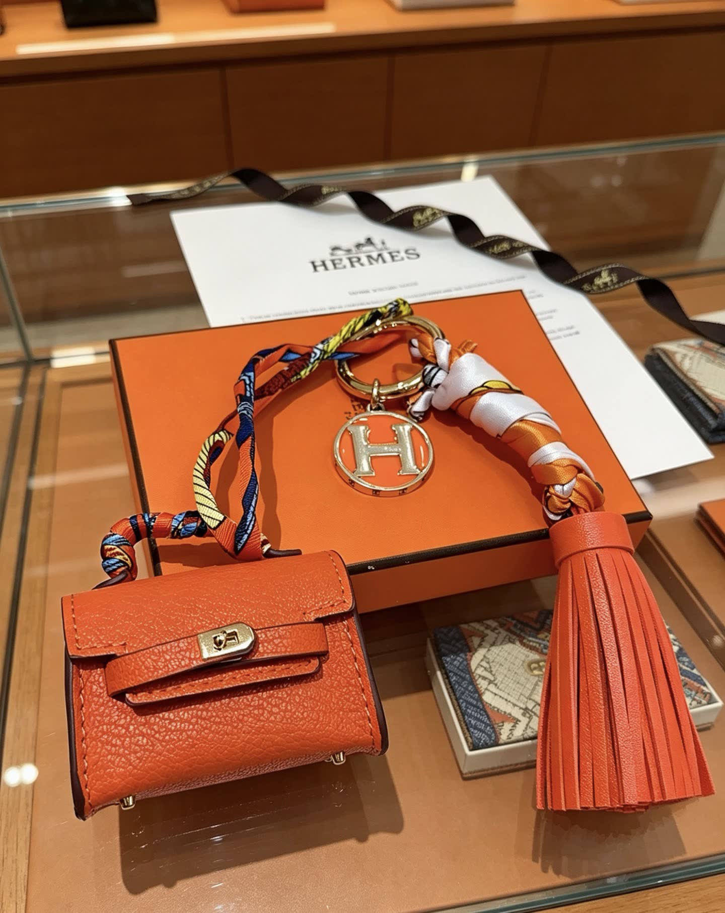 Hermes Hermès Orange Leather Keychain with Tassel