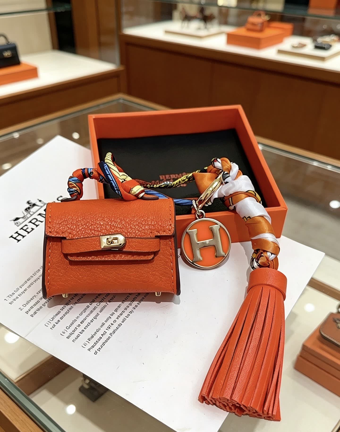 Hermes Hermès Orange Leather Keychain with Tassel
