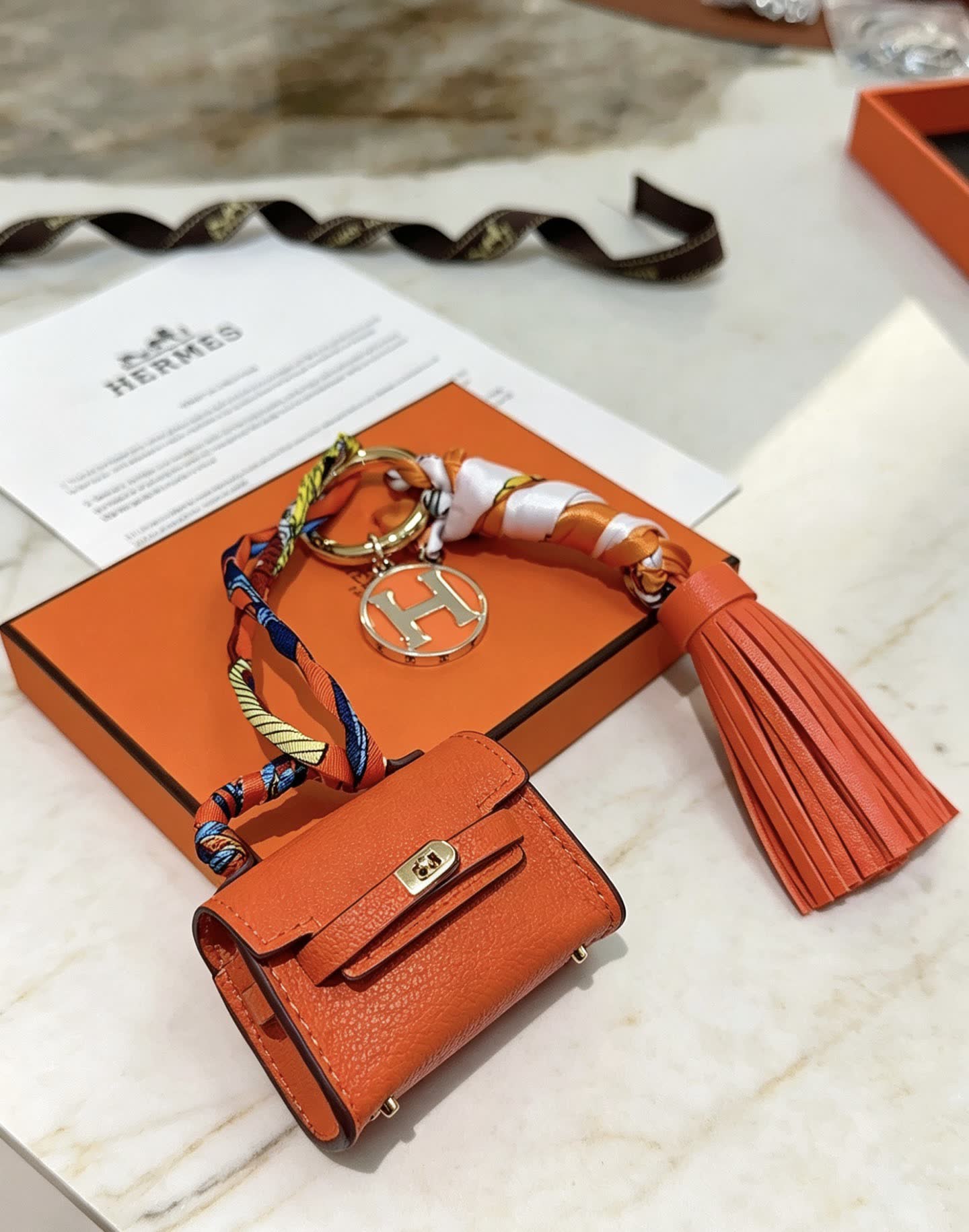 Hermes Hermès Orange Leather Keychain with Tassel