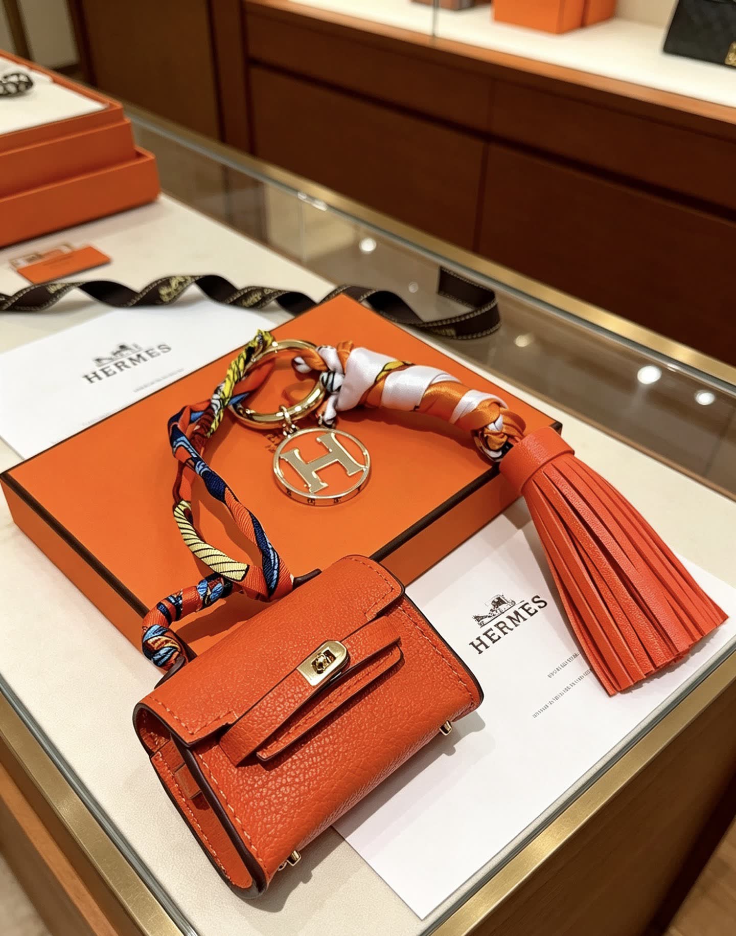 Hermes Hermès Orange Leather Keychain with Tassel