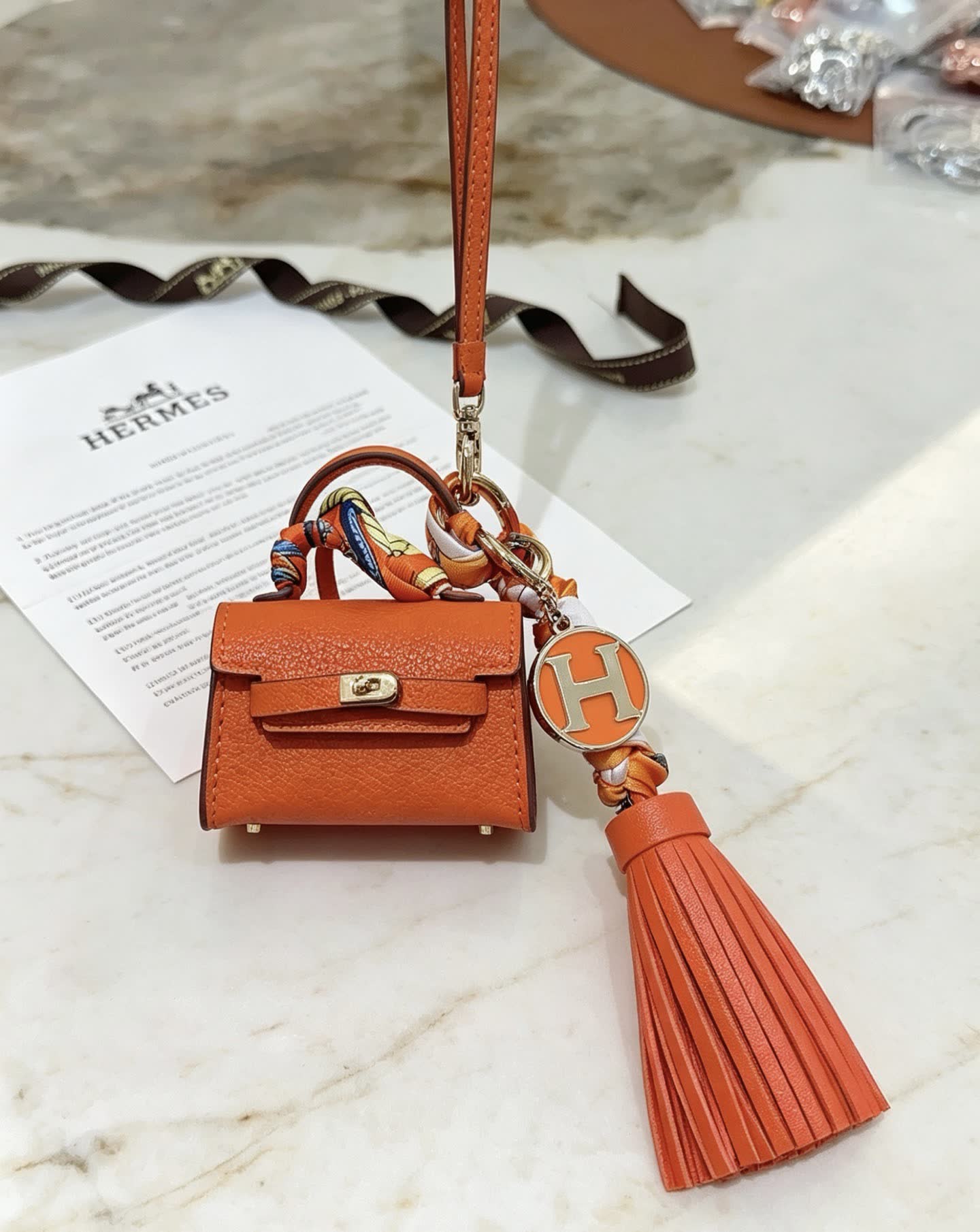 Hermes Hermès Orange Leather Keychain with Tassel