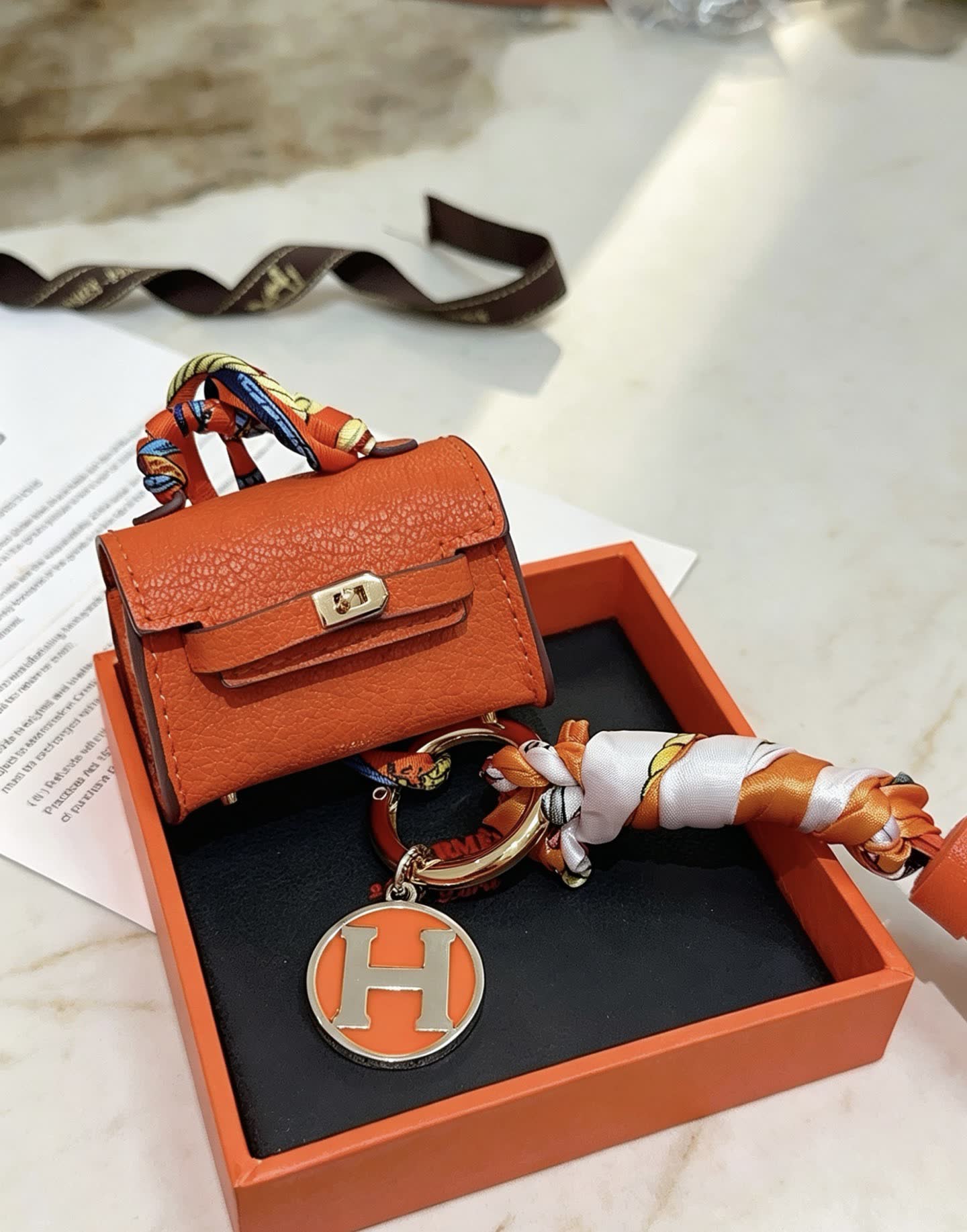 Hermes Hermès Orange Leather Keychain with Tassel