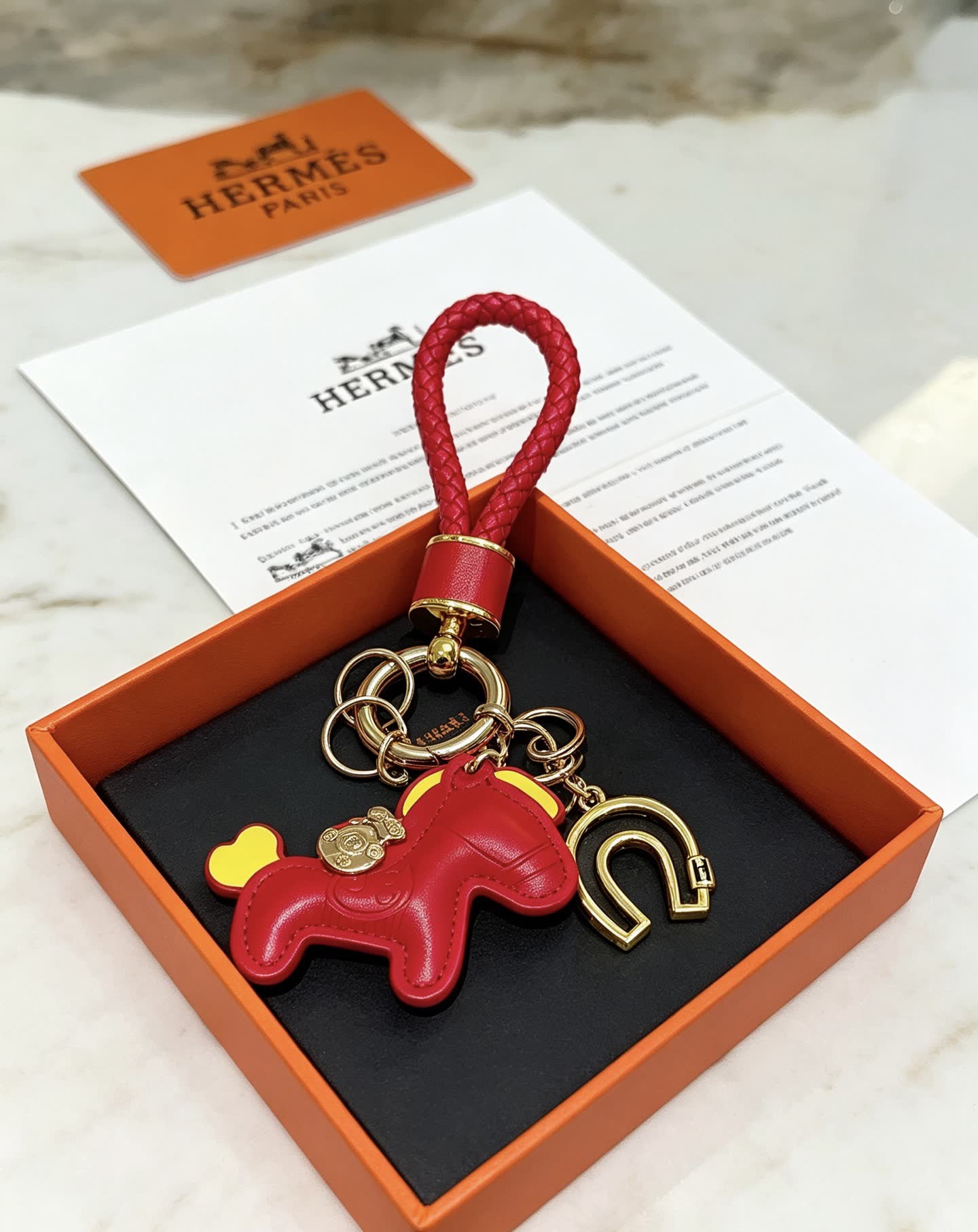 Hermes Hermès Paris Leather Keychain with Red and Gold Horseshoe Charm