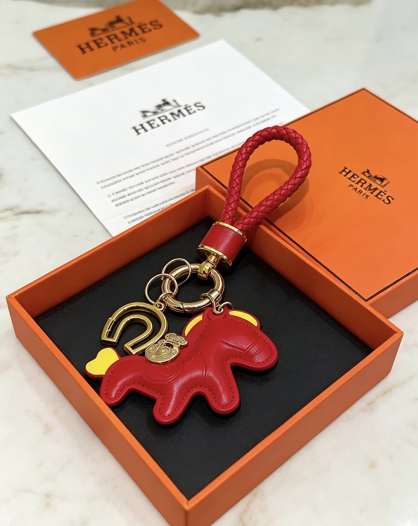 Hermes Hermès Paris Leather Keychain with Red and Gold Horseshoe Charm