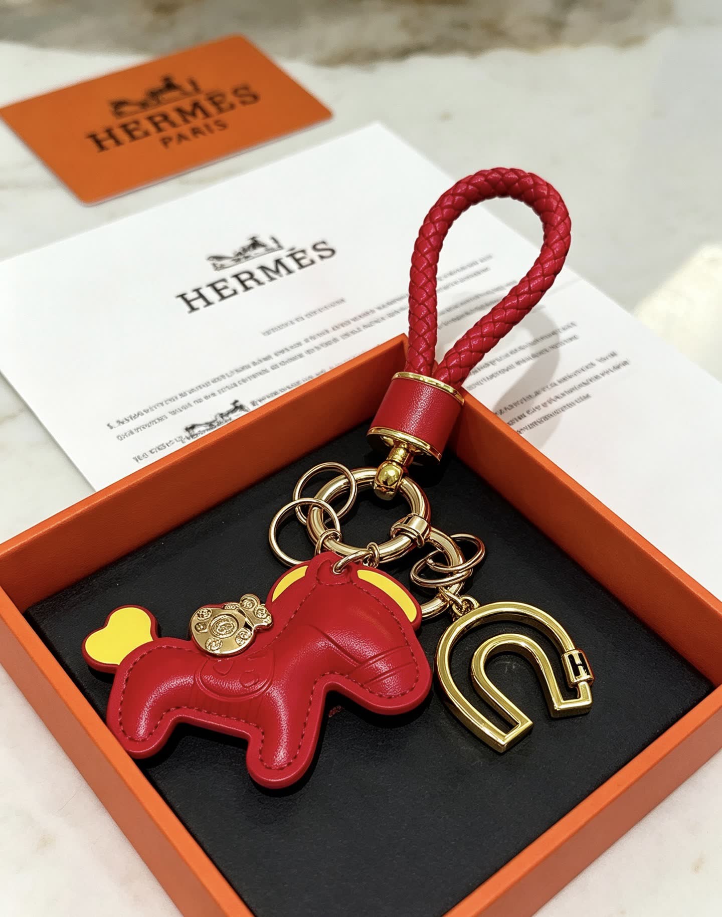 Hermes Hermès Paris Leather Keychain with Red and Gold Horseshoe Charm
