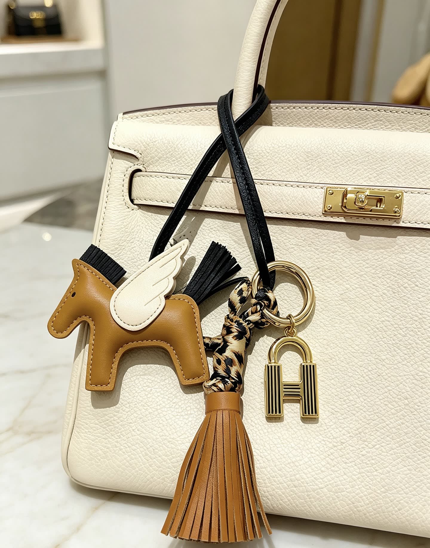 Hermes Hermès Brown Leather Winged Horse Keychain with Tassel