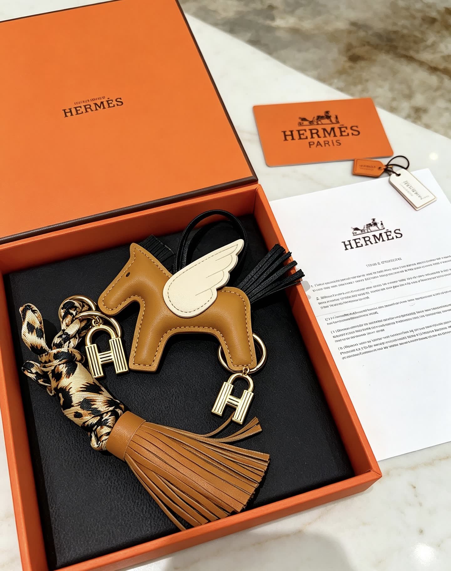 Hermes Hermès Brown Leather Winged Horse Keychain with Tassel