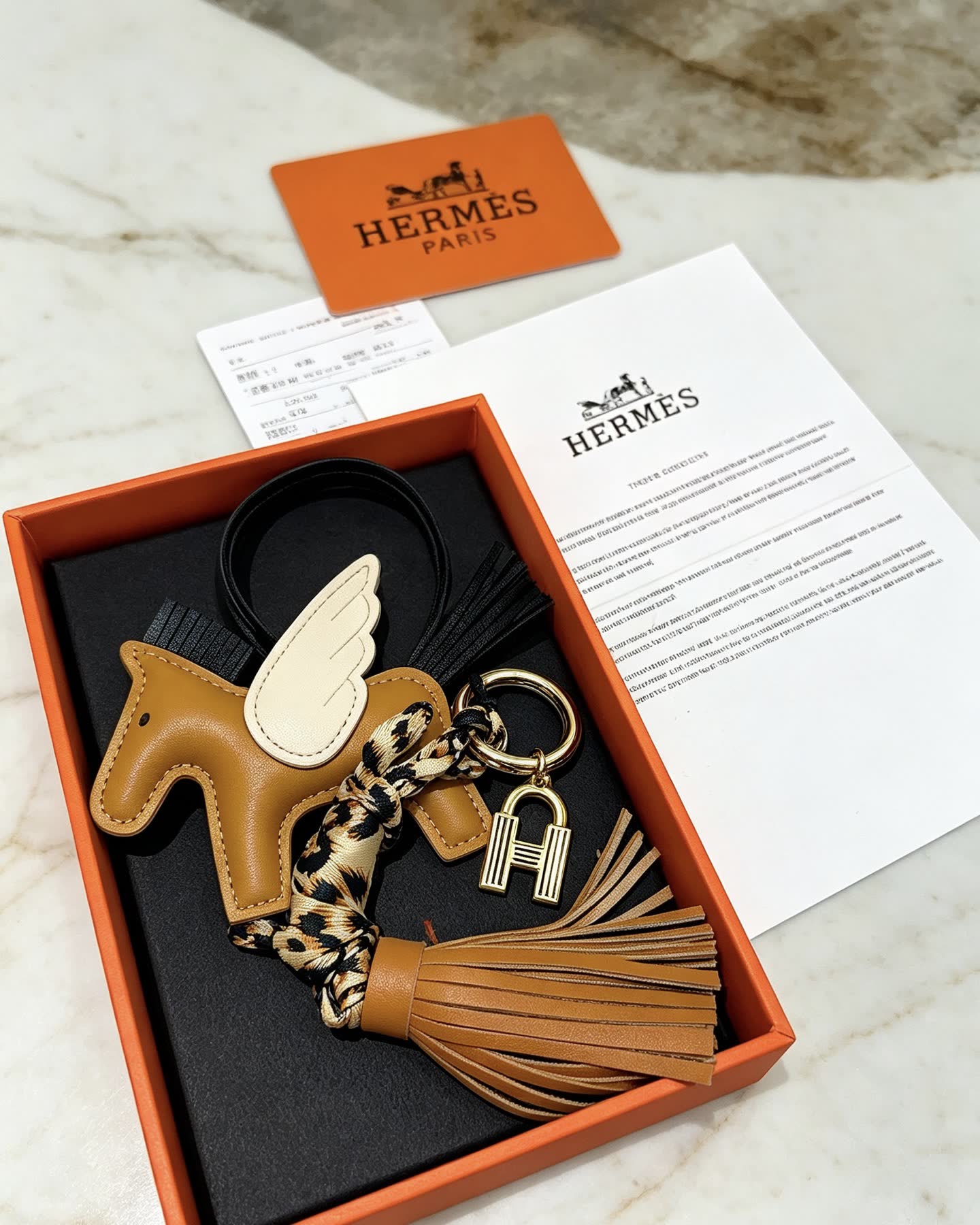 Hermes Hermès Brown Leather Winged Horse Keychain with Tassel